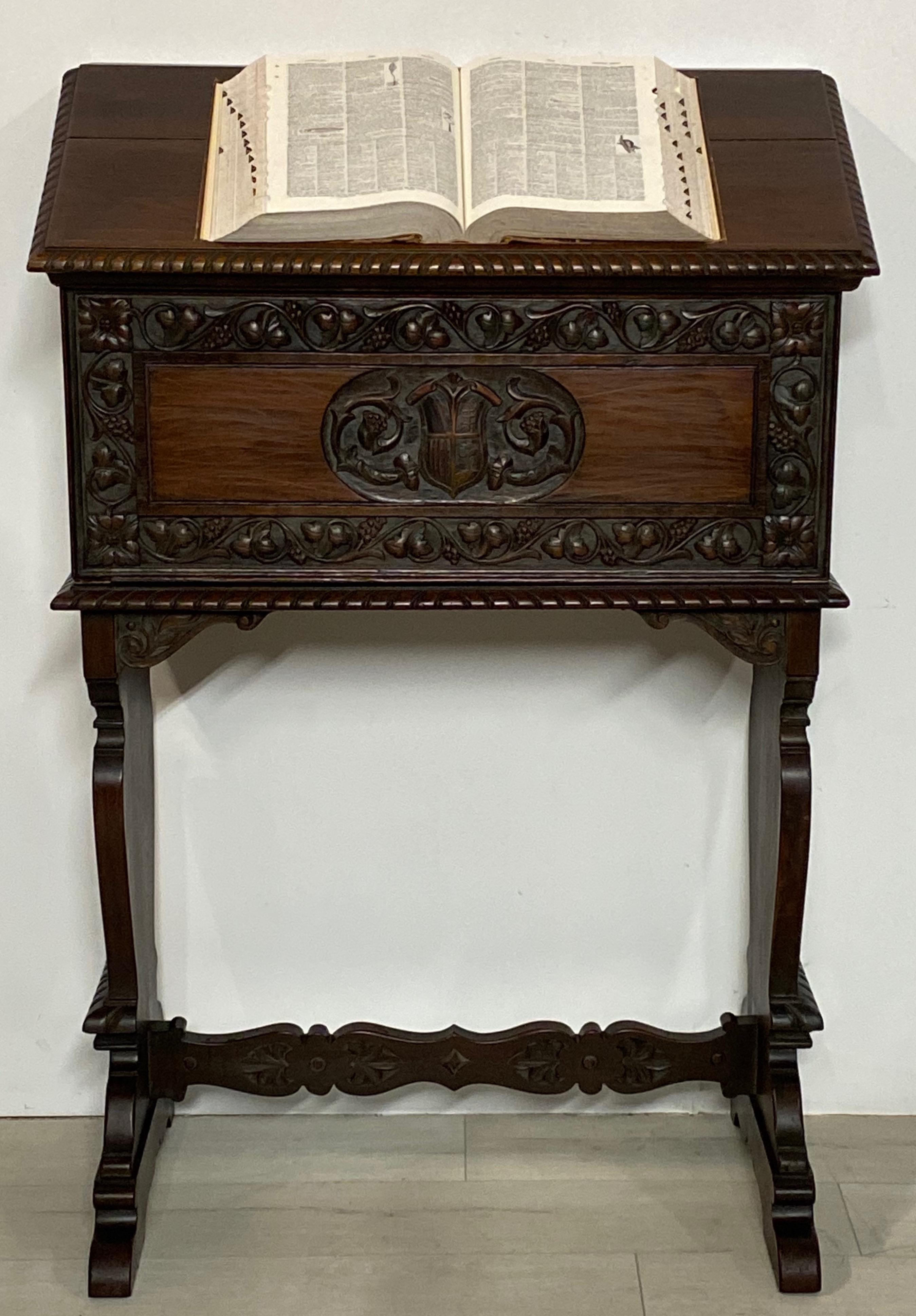 A 16th century Florentine style, podium height drop front desk. Beautifully carved solid walnut, having a fitted interior, and 32 inch writing surface when open. 
Italian, early 20th century, circa 1920.