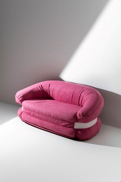 Italian fluid Sofa Premiere in pink bouclé by Adriano Piazzesi
