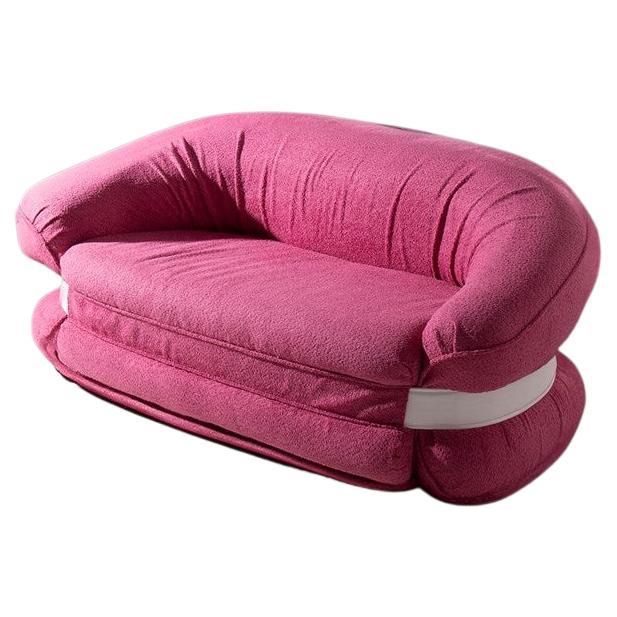 Italian fluid Sofa Premiere in pink bouclé by Adriano Piazzesi