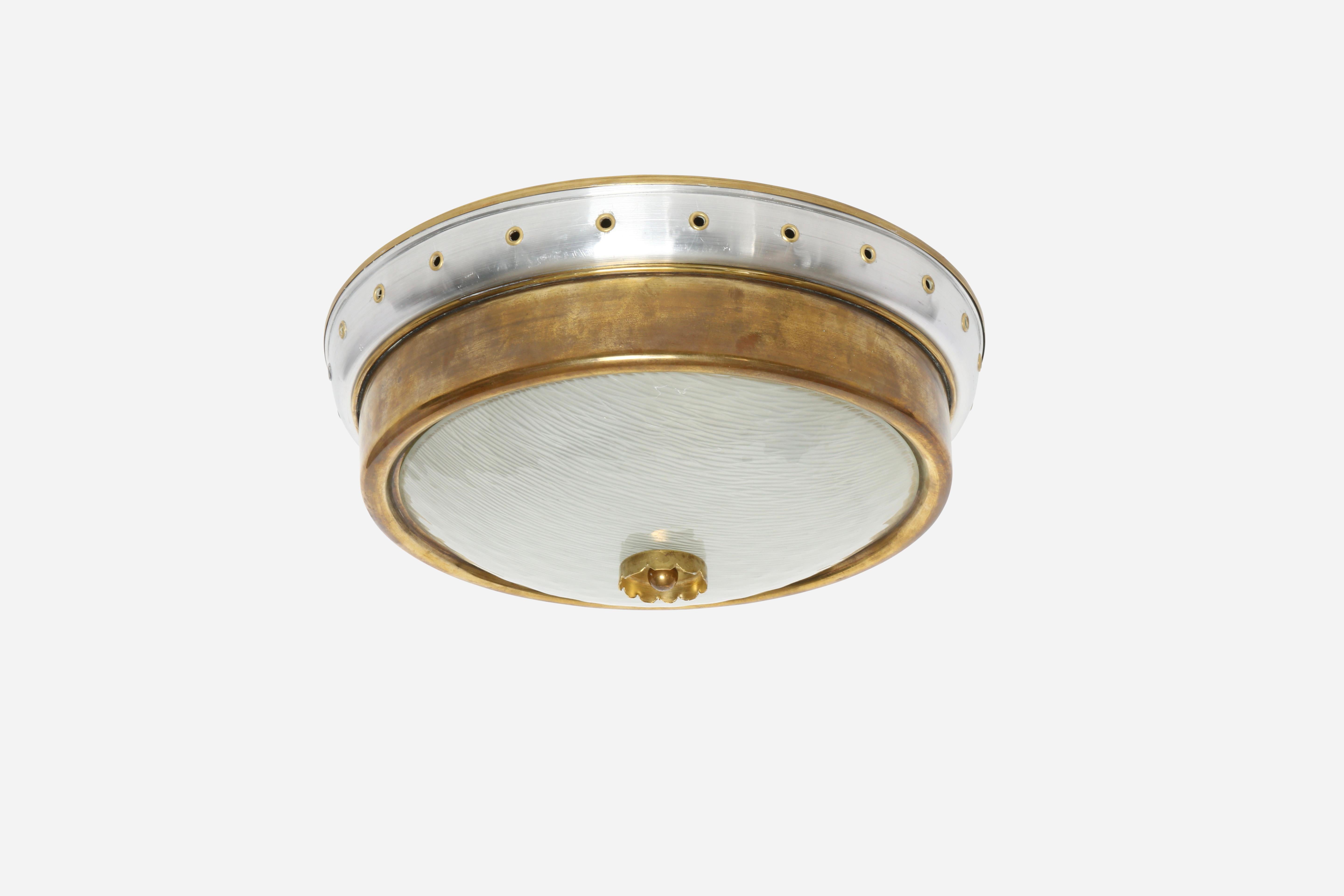 Italian flush mount ceiling light.
Designed and made in Italy in 1960s.
Brass, aluminum, textured glass.
3 candelabra sockets.
Complimentary US rewiring upon request.
