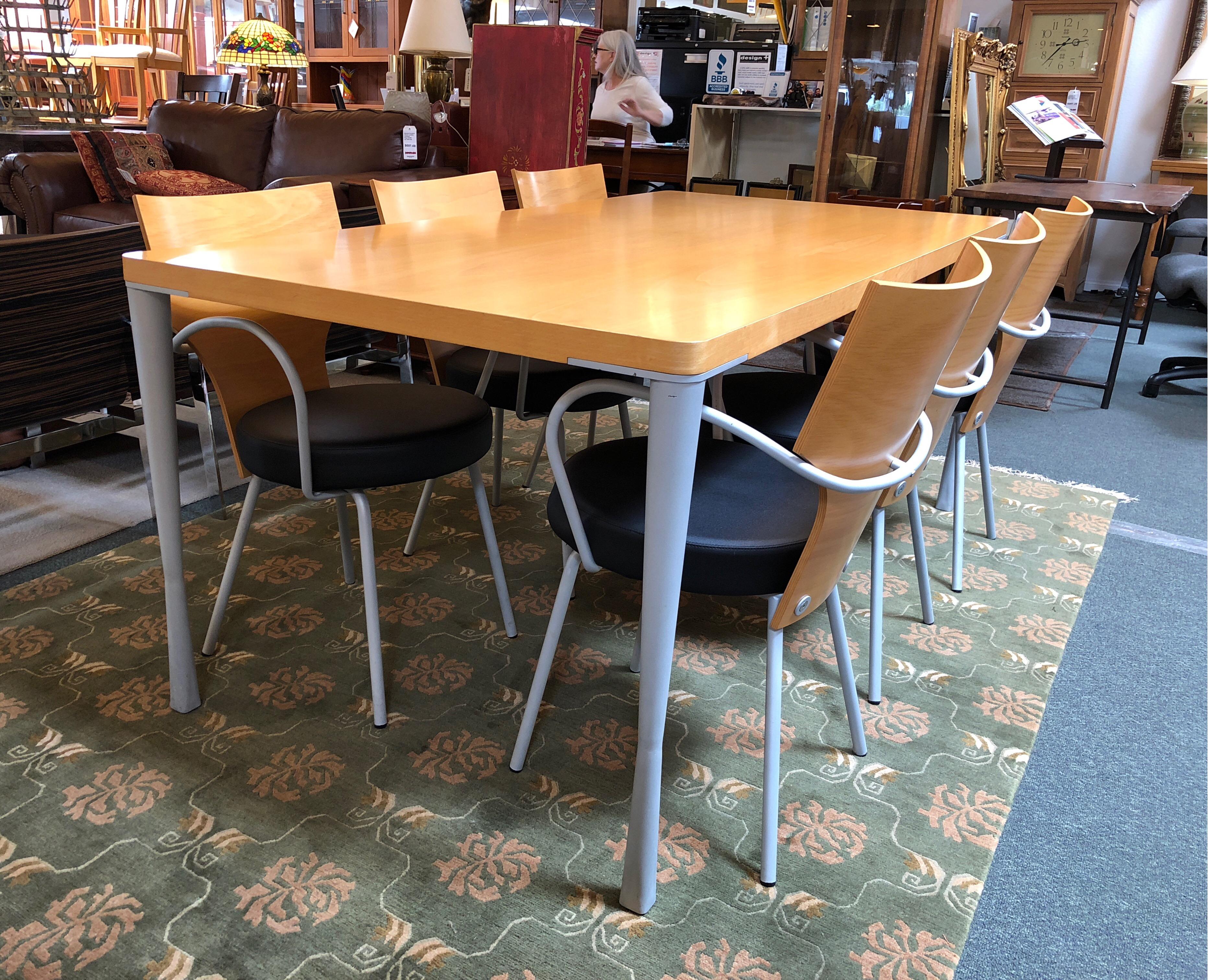 A vintage fly line dining set, made in Italy. Timeless contemporary styling, the birch, steel and leather set offers dining for up to eight. Powder-coat finish on sculptural table legs and chair frame makes durability a feature. Natural birch wood