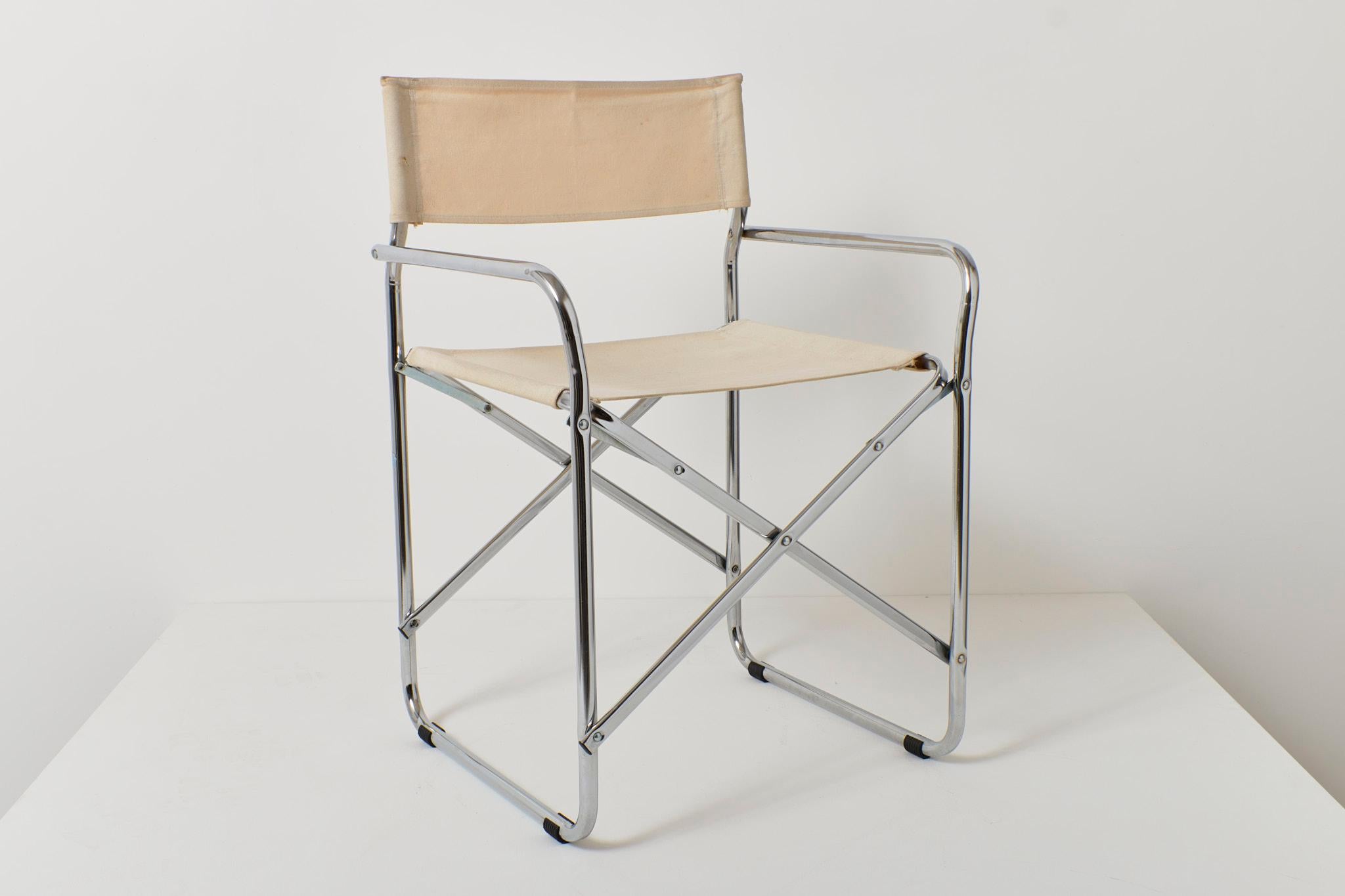 Italian folding chair with canvas seat on a chrome frame made by Grazioli Giocattoli. Circa 1970’s. The design is very similar to Gae Aulenti’s folding chair for Zanotta.

Condition is good with minor wear consistent with age.

Dimensions: W54cm