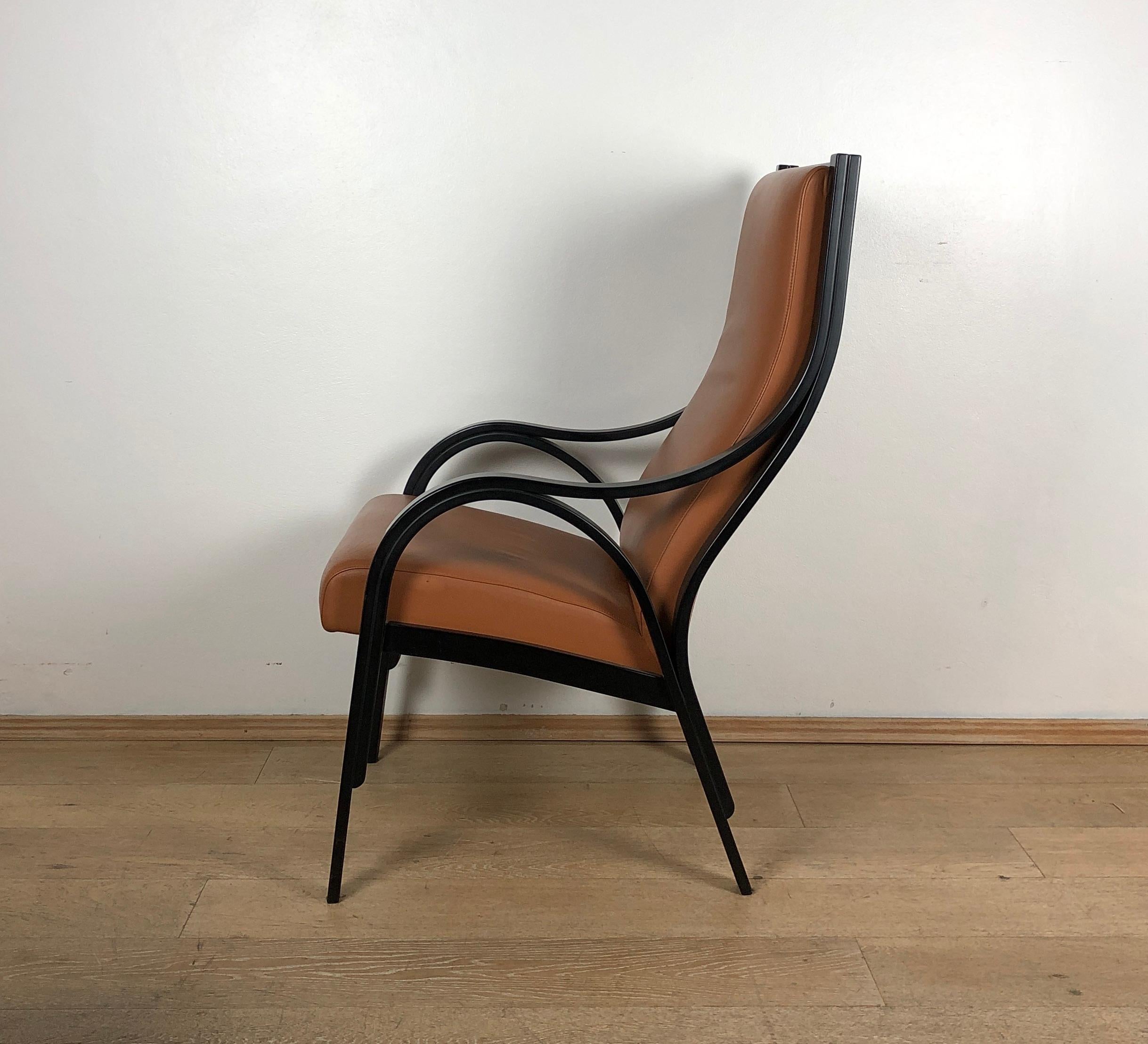 International Style Italian for Poltrona Frau Cavour tobacco Leather black wood structure Armchair