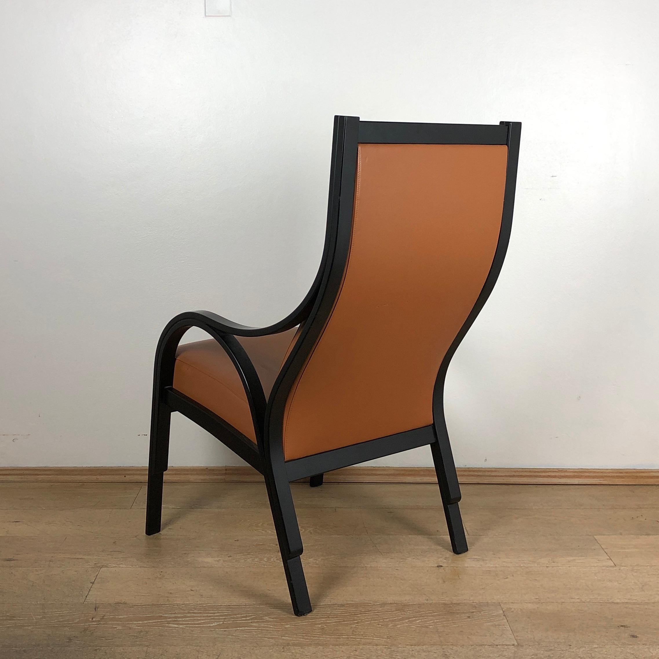 20th Century Italian for Poltrona Frau Cavour tobacco Leather black wood structure Armchair