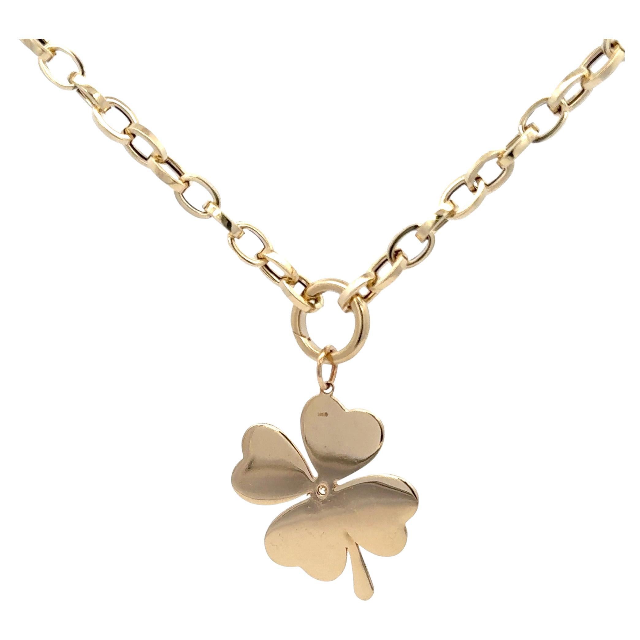 Italian four leaf clover pendant featuring one center diamond weighing .05 carats on a 18