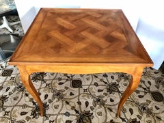 Italian Fruitwood Game Dining Table with Four Barrel Back Brown Leather Chairs