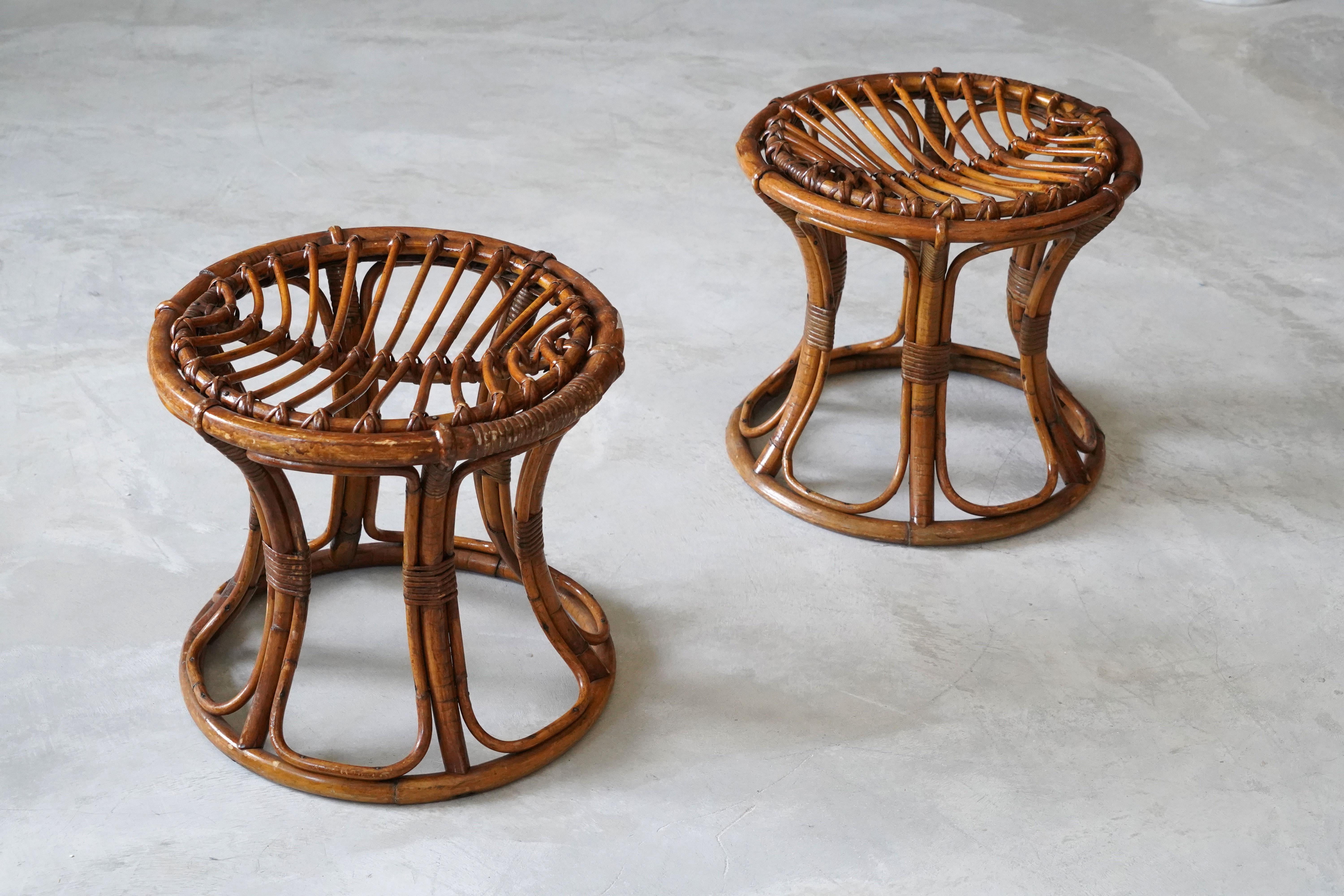 A pair of stools. Designed and produced in Italy, 1950-1960s. 

Other designers of the period include Gabriella Crespi, Paul Frankl, Charlotte Perriand, Pierre Chapo and George Nakashima.