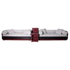 Pair of Italian Futurist-era geometric sofa with cotton fabric