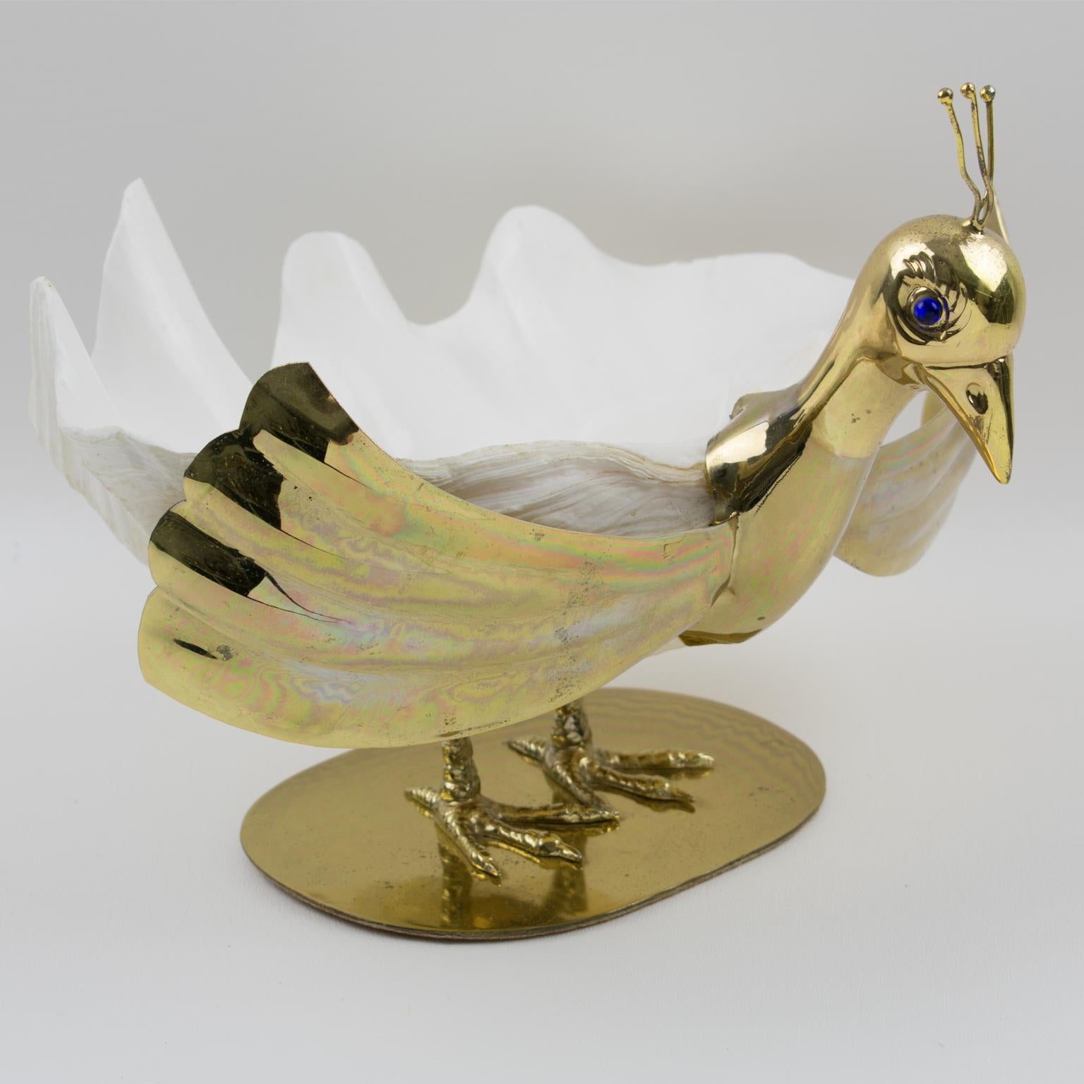 Beautiful large seashell swan designed and handcrafted by Italian artist Gabriella Binazzi. You can just imagine the ocean in this lovely Binazzi object of art. The swan neck, feet, and wings are anodized gilded metal in original shiny condition,