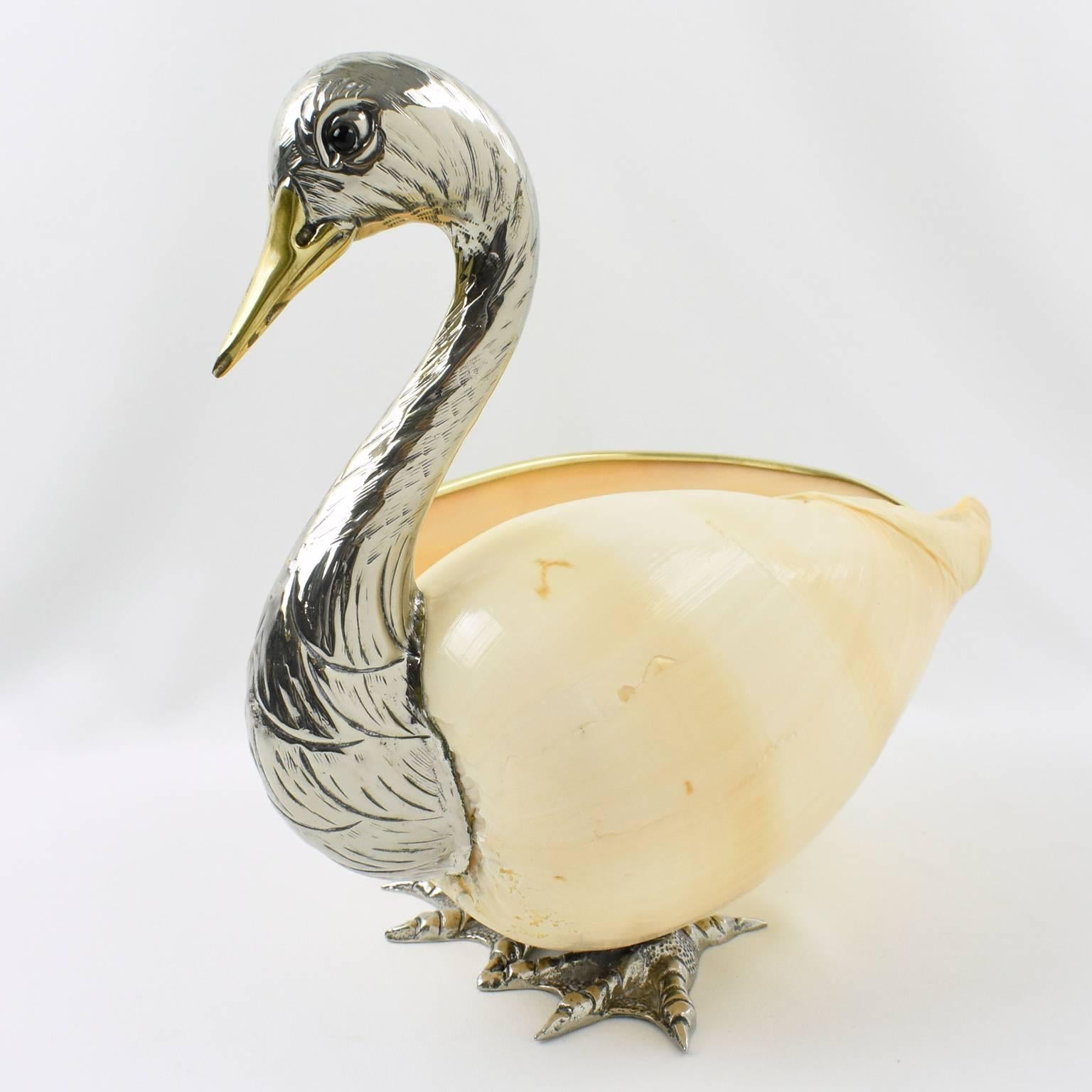 Beautiful large seashell swan designed and hand-crafted by Italian artist Gabriella Binazzi. You can hear the ocean in this lovely Binazzi object of art. The swan neck and feet are silver plated brass in original shiny condition, with black glass