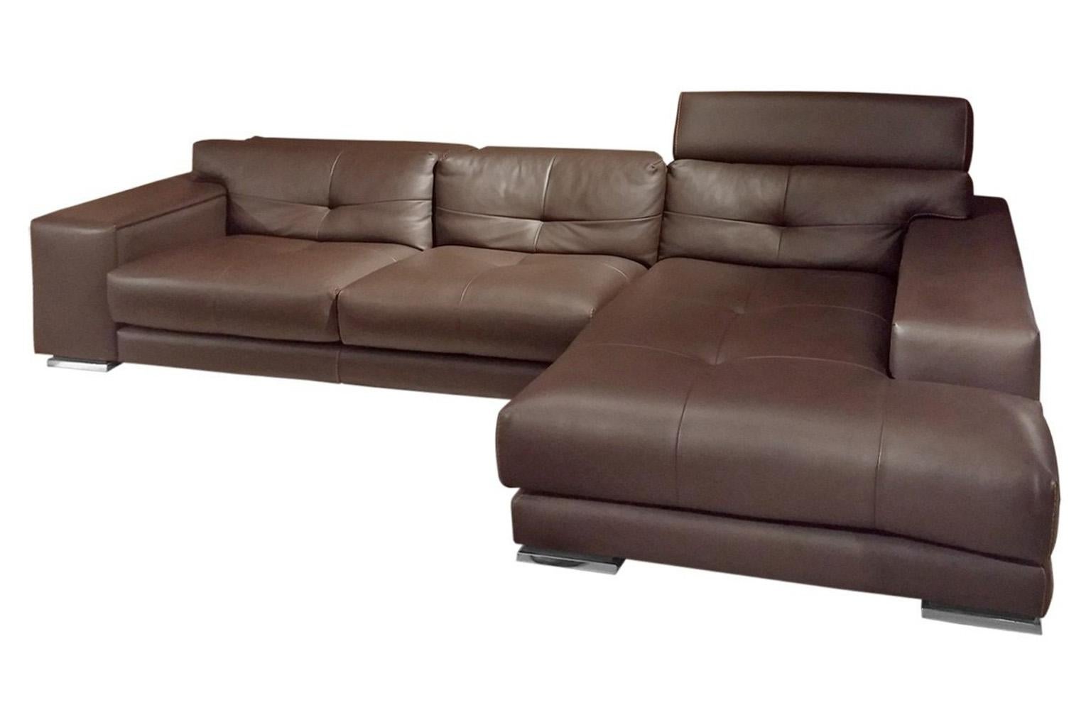 Leather sectional with Chaise in dark rich brown luxurious soft leather.
Top grain leather upholstery with contrast stitching.
Tufted cushions.
Special ratchet headrest cushion with polished chrome mechanism.
Chrome and wood