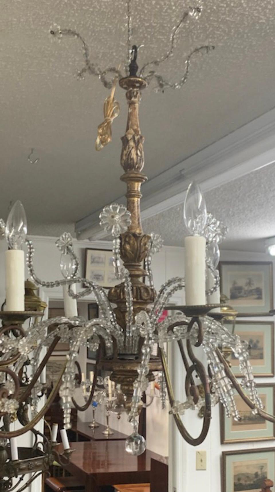 Araña italiana genovesa, madera dorada, hierro forjado y cristal siglo XVIII y antes en venta