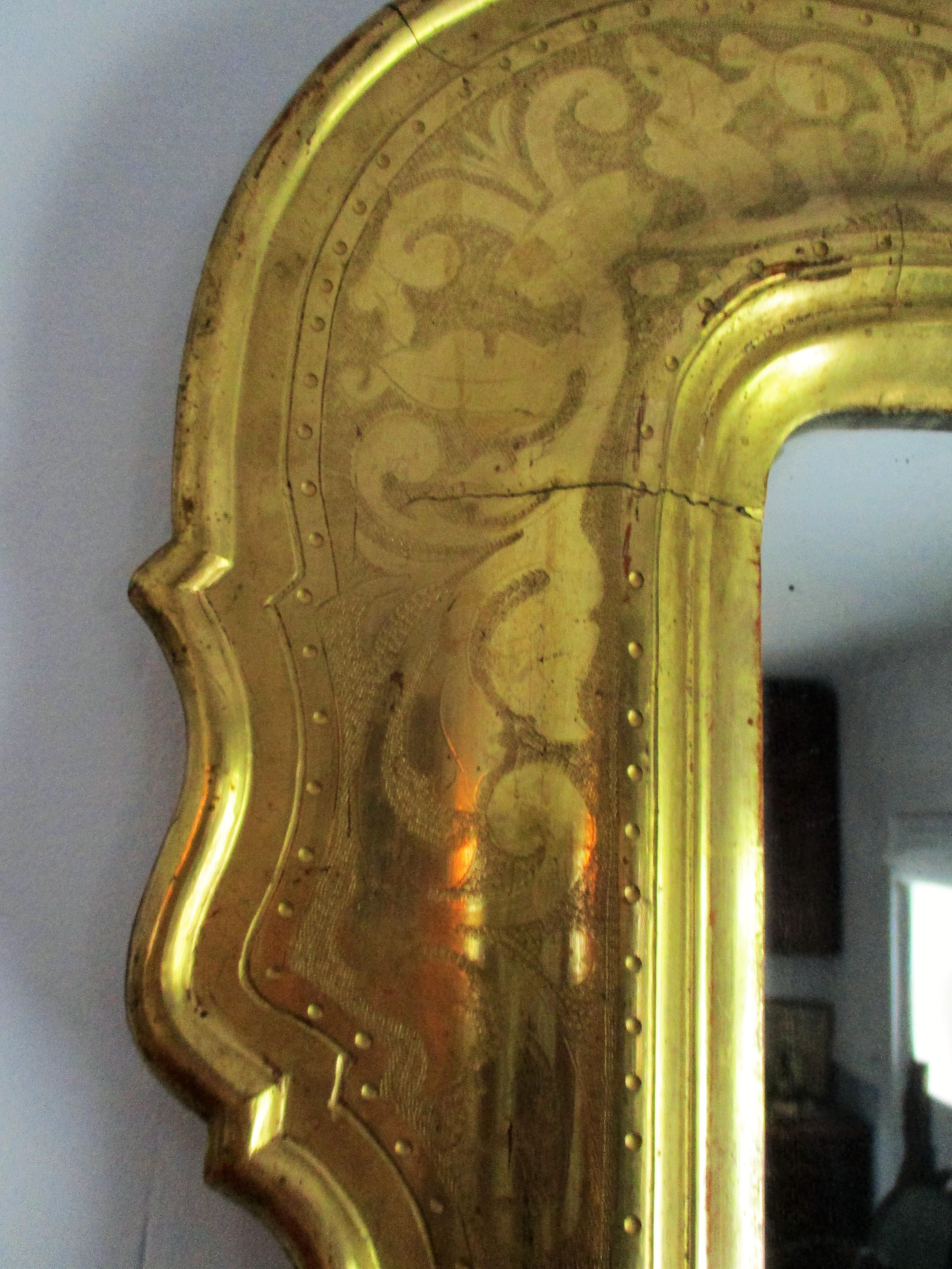Gorgeous Italian Genovese mid-19th century etched gold leaf mirror with original mercury glass.