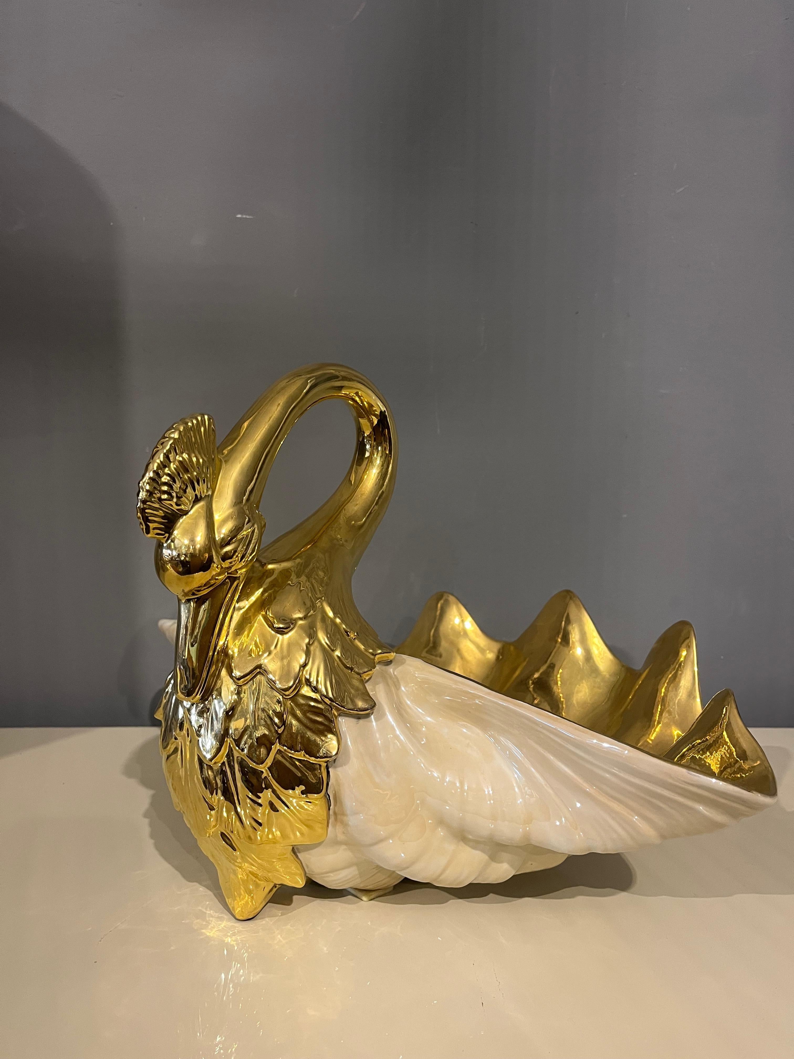 Italian giant swan in shell by Gabriella Binazzi. In a world where the boundary between art and imagination is becoming increasingly thin, the extraordinary work of Gabriella Binazzi, a Florentine artist capable of transforming matter into pure