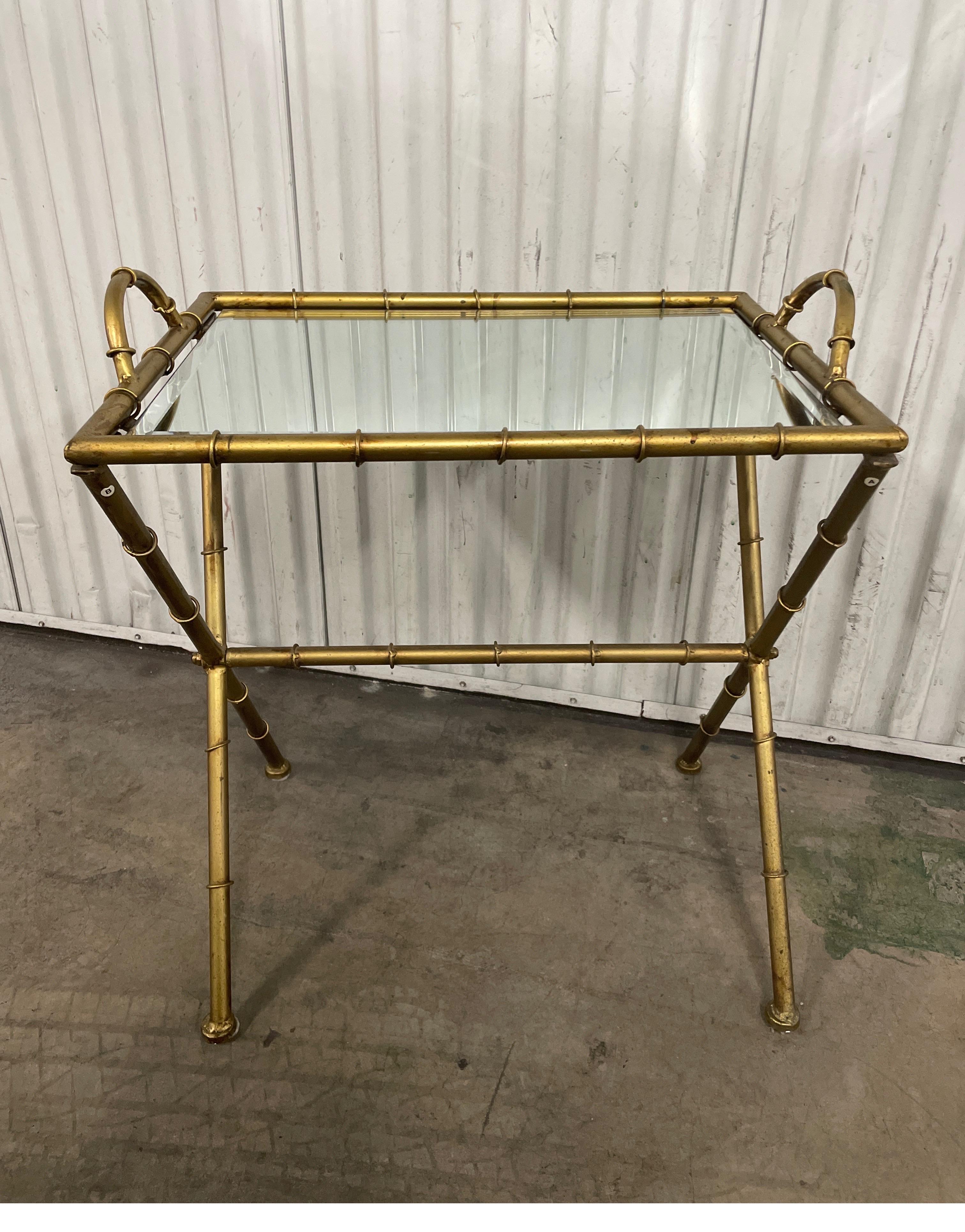 Chic faux bamboo mirrored top tray / snack table with two handles for easy transport.