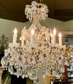 Italian gilt brass and crystal chandelier with eight lights