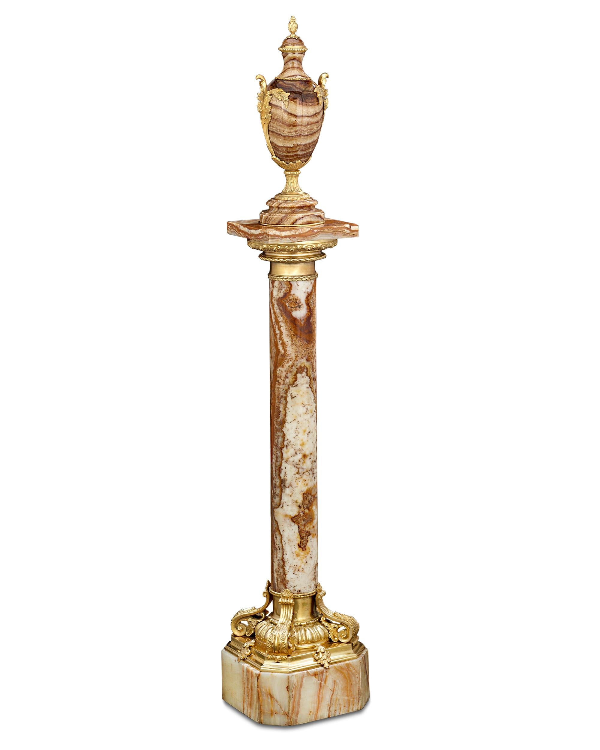 This exquisite Italian pedestal and urn, masterfully crafted from the esteemed Alabastro Fiorito Antico marble, represents the very finest of 19th-century Italian craftsmanship. Alabastro Fiorito Antico marble is one of the most sought-after and