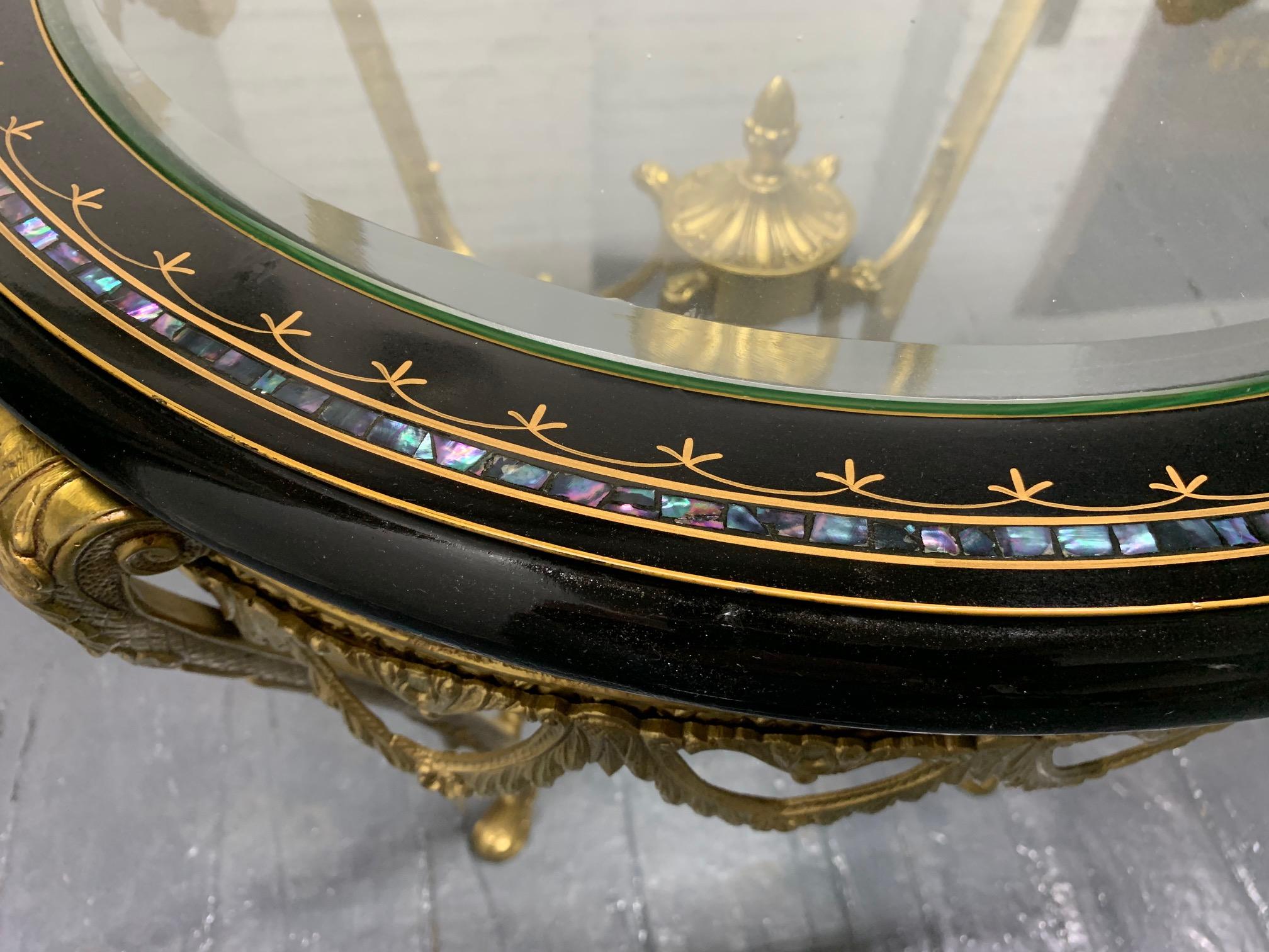 Baroque Italian Gilt Bronze Table with Ebonized Top and Mother of Pearl Inlay For Sale