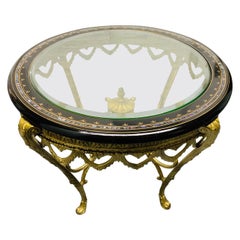 Italian Gilt Bronze Table with Ebonized Top and Mother of Pearl Inlay