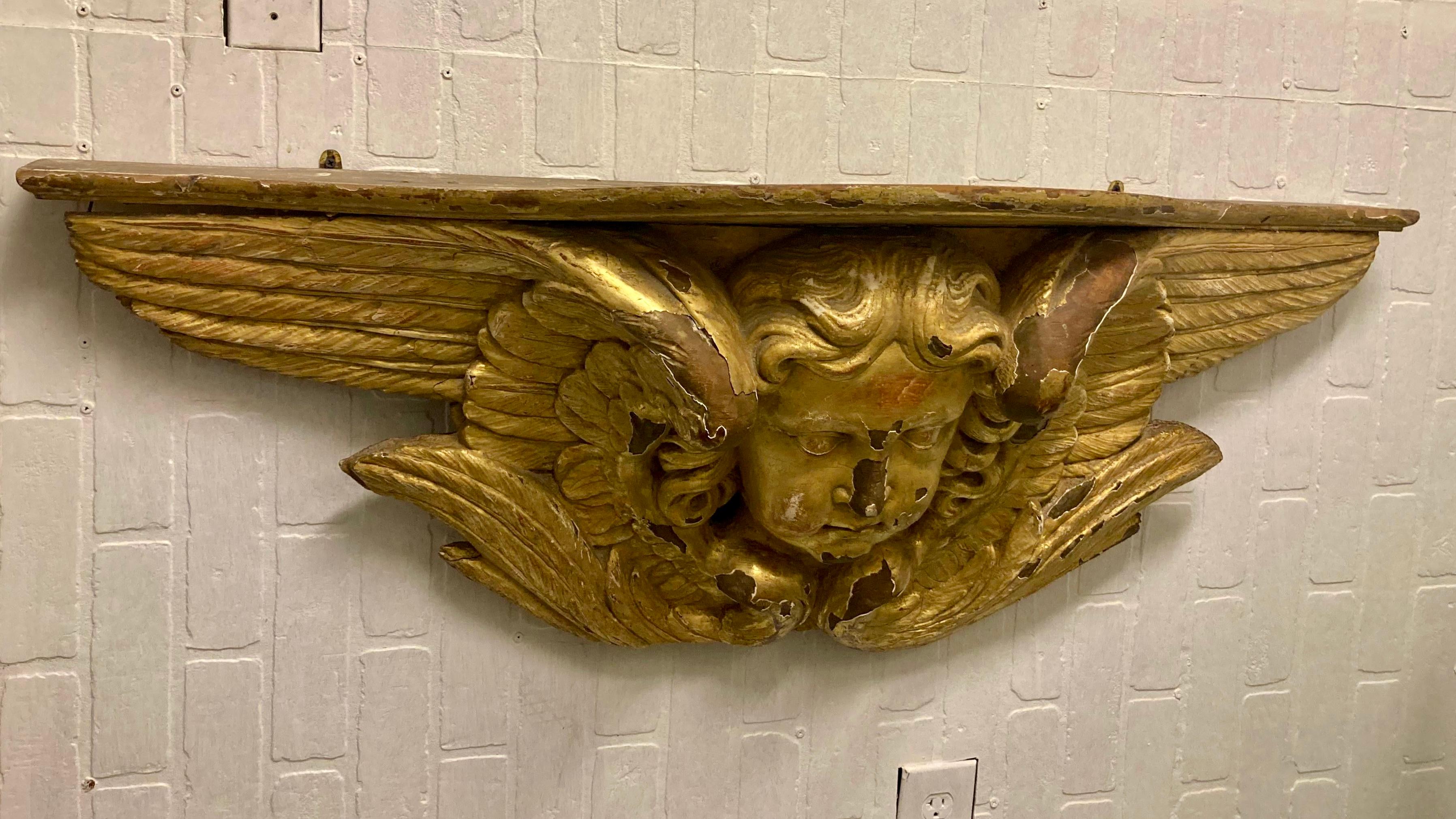 18th Century and Earlier Italian Gilt Carved Wood Angel Wall Mounted Console For Sale