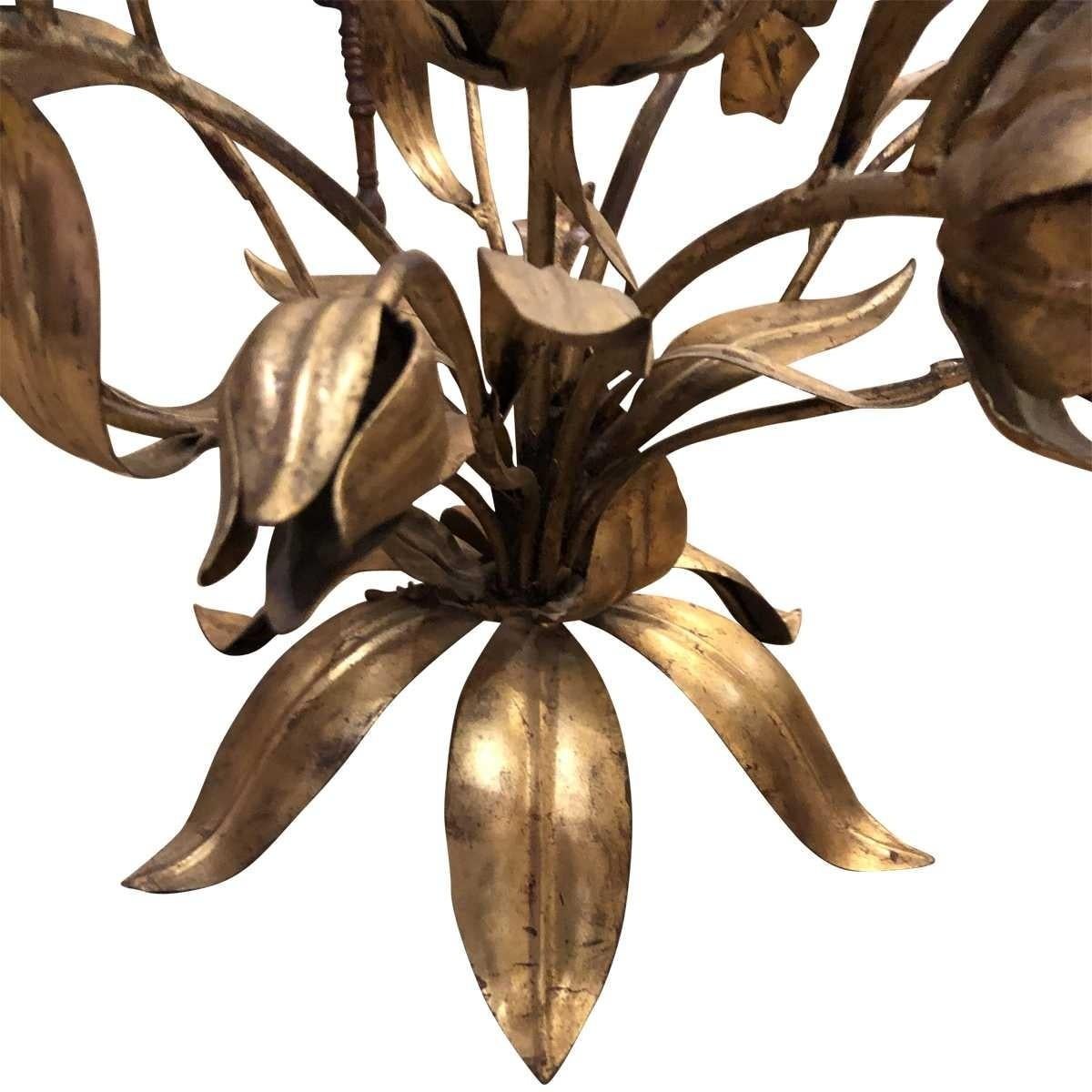 Gilt-metal leaves and flowers.
Round glass.
Not eligible for promotional discount

Materials: Metal, glass
Dimensions:
Height 17