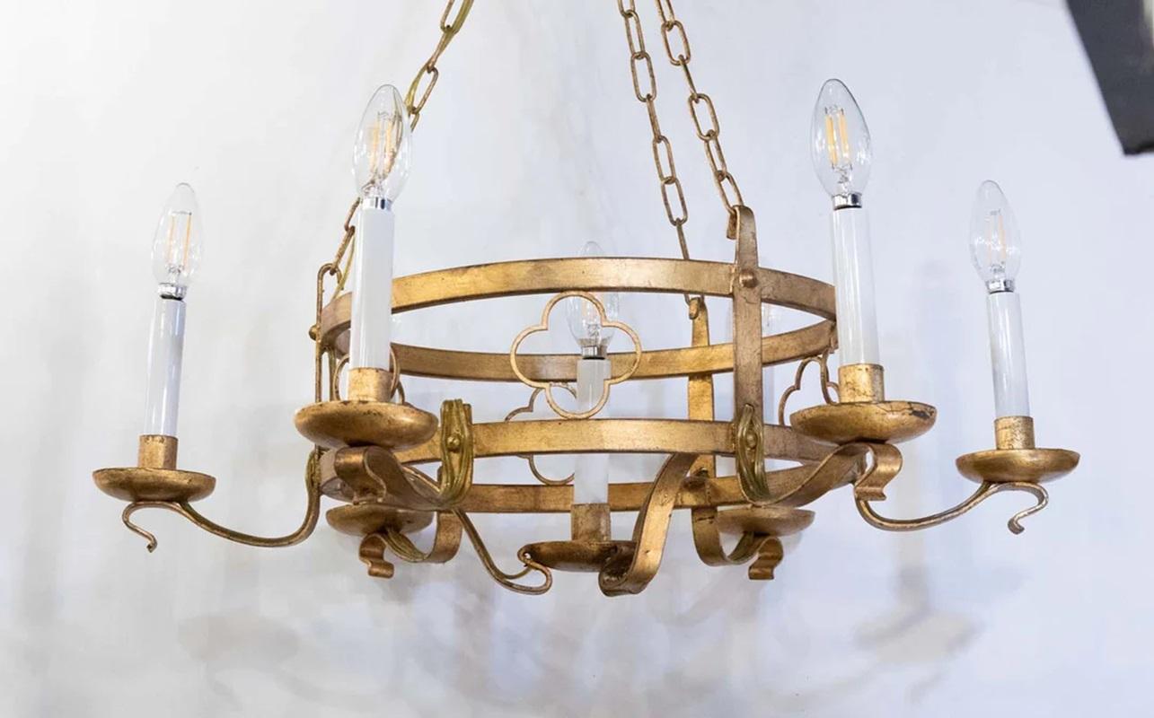 Italian gilt Tole chandelier with seven lights and original canopy. Measures 46