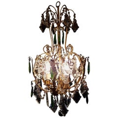 Italian Gilt Iron Chandelier with Green Pendalogues, 1930 Italian Gilt Iron Chandelier with Green Pendalogues, 1930