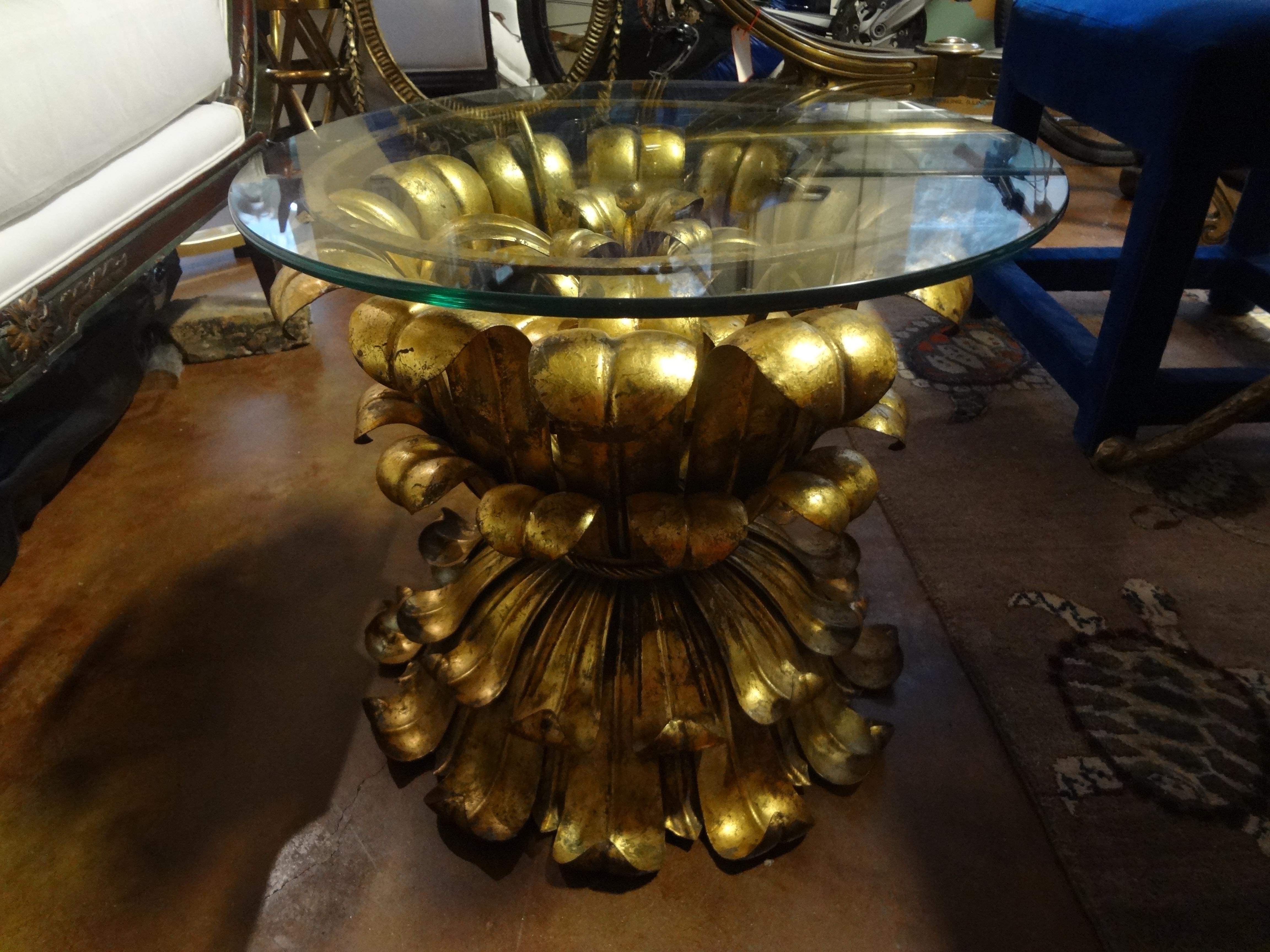 Stunning vintage Italian gilt iron or gilt metal table with glass top. Our Hollywood Regency Italian gilt iron plume table or palm frond table is the perfect side table, drinks table, guéridon or cigarette table. This Italian gilt plume table is