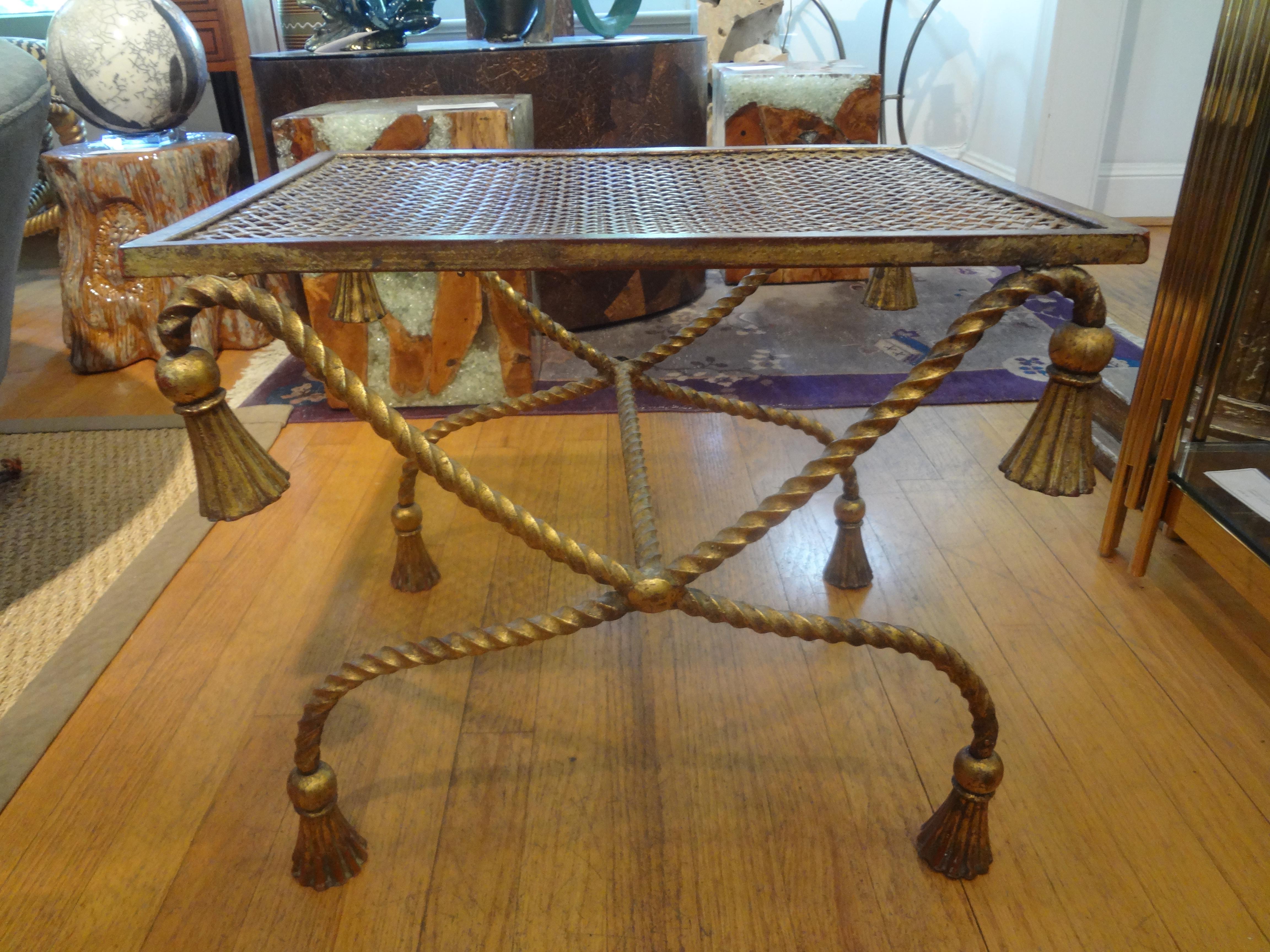 Italian gilt iron rope and tassel table or bench.
Stunning and versatile Italian gilt iron rope and tassel table, bench, stool or ottoman. Good weight and beautifully made.