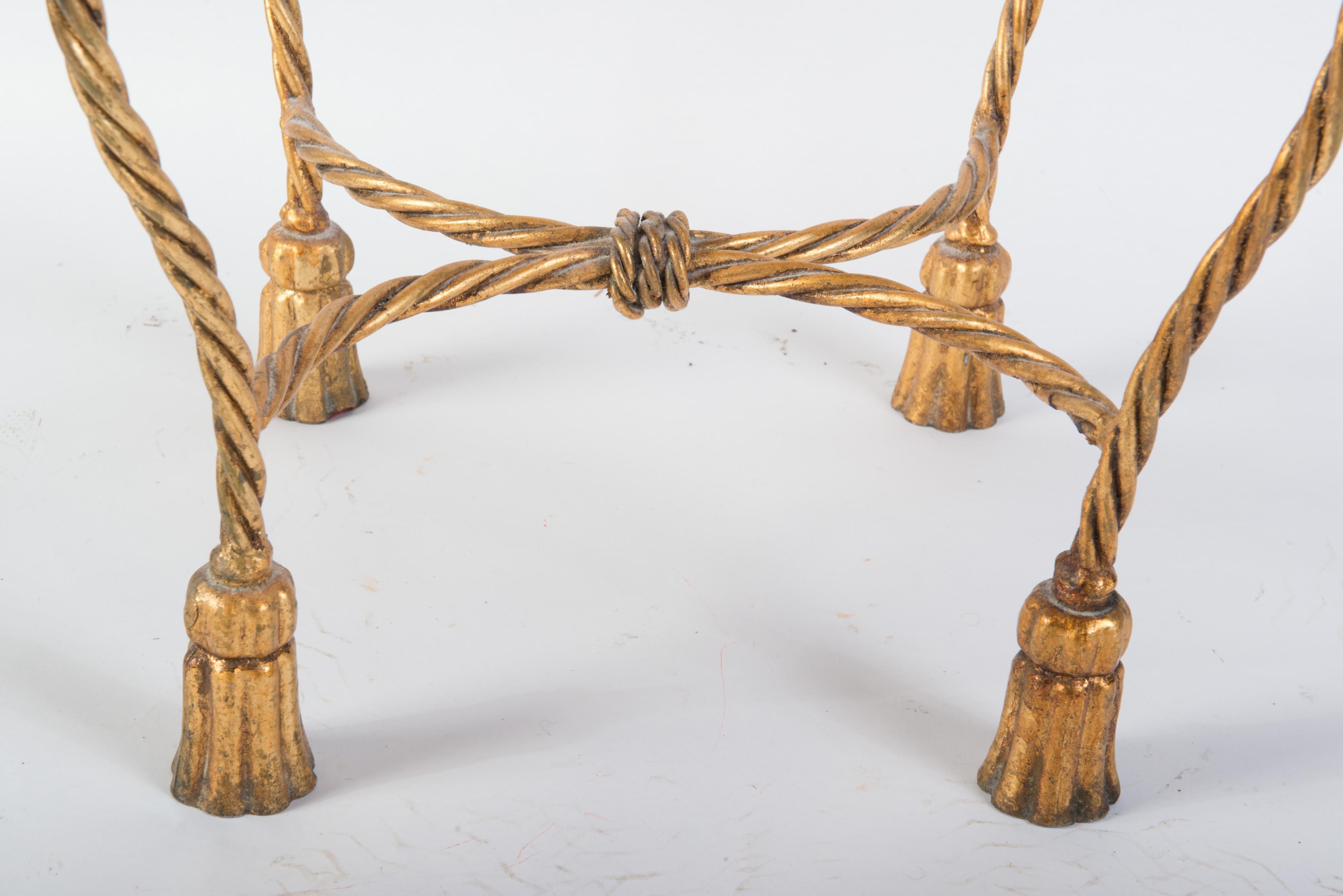 Gilt wrought iron rope and tassel boudoir chair made in Italy. Great vanity or dressing table chair.