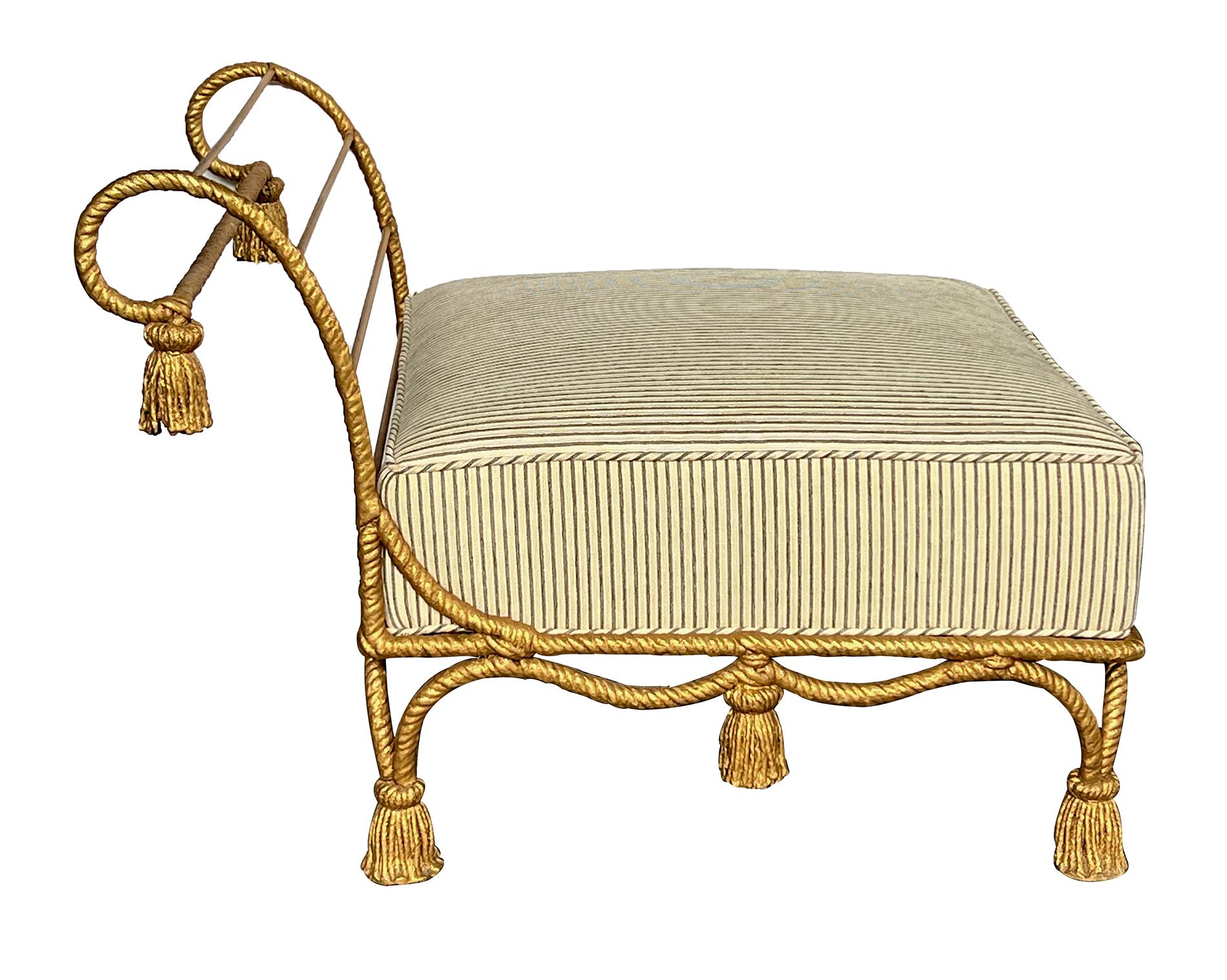 the square upholstered seat with a low out-scrolled openwork backrest; all above an undulating apron raised on tassels