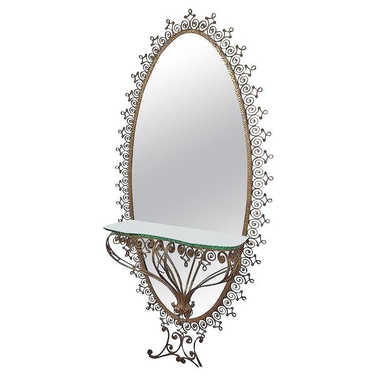 Consola y espejo italianos de metal dorado de Pier Luigi Colli, 1955 en venta