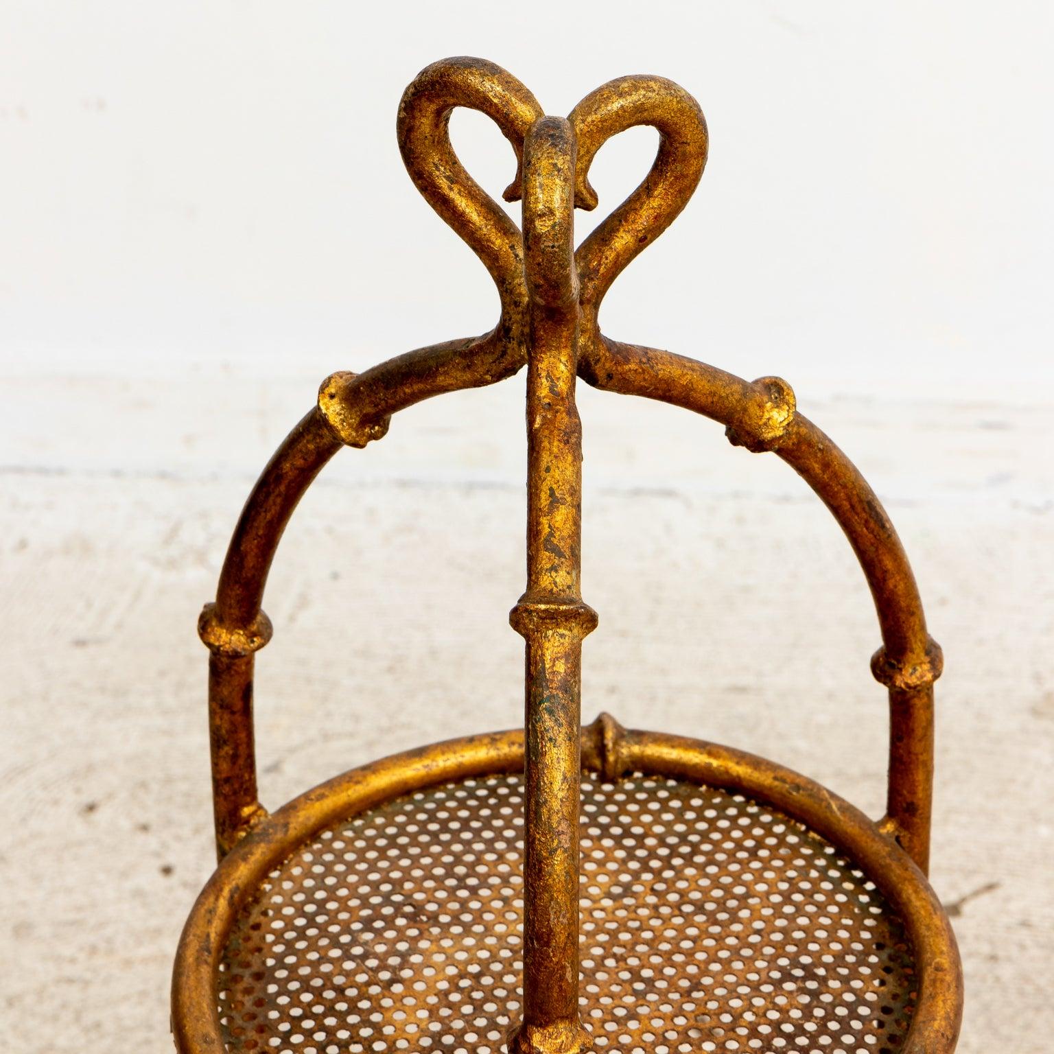 Midcentury gilt metal stand with 3 mesh surfaces has faux bamboo details. Can be placed on the floor or tabletop. Please note of wear consistent with age.