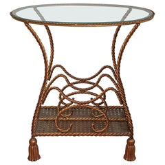 Table porte-revues italienne en métal doré avec corde et glands en forme de pompon