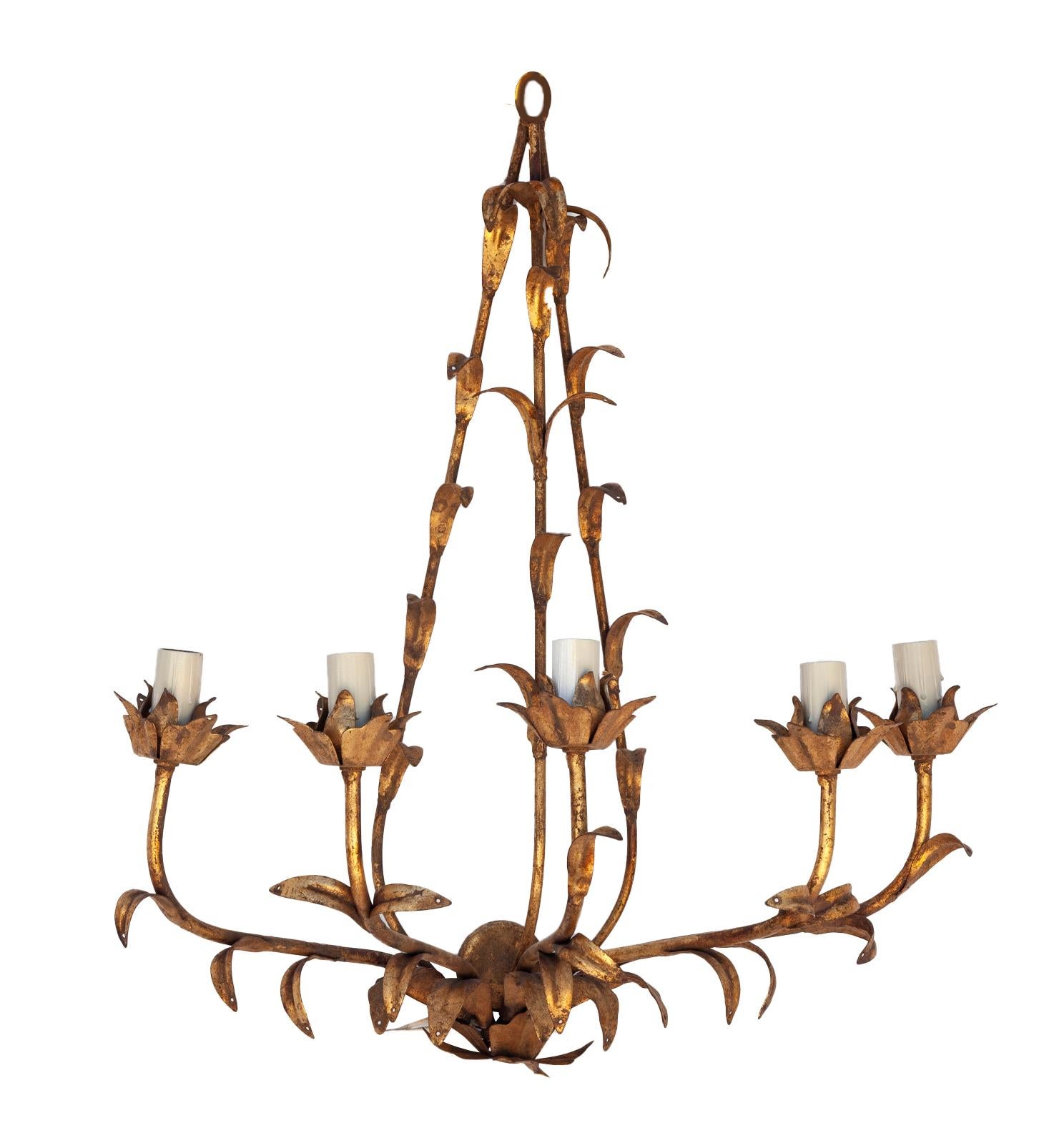 Stunning pair of mid-century gilt Italian tole wall sconces in the Hollywood regency style. The pair each with five lights, they would make a fabulous statement in a foyer, hall, dining room, or master bed or bath.
optional teardrop crystals are