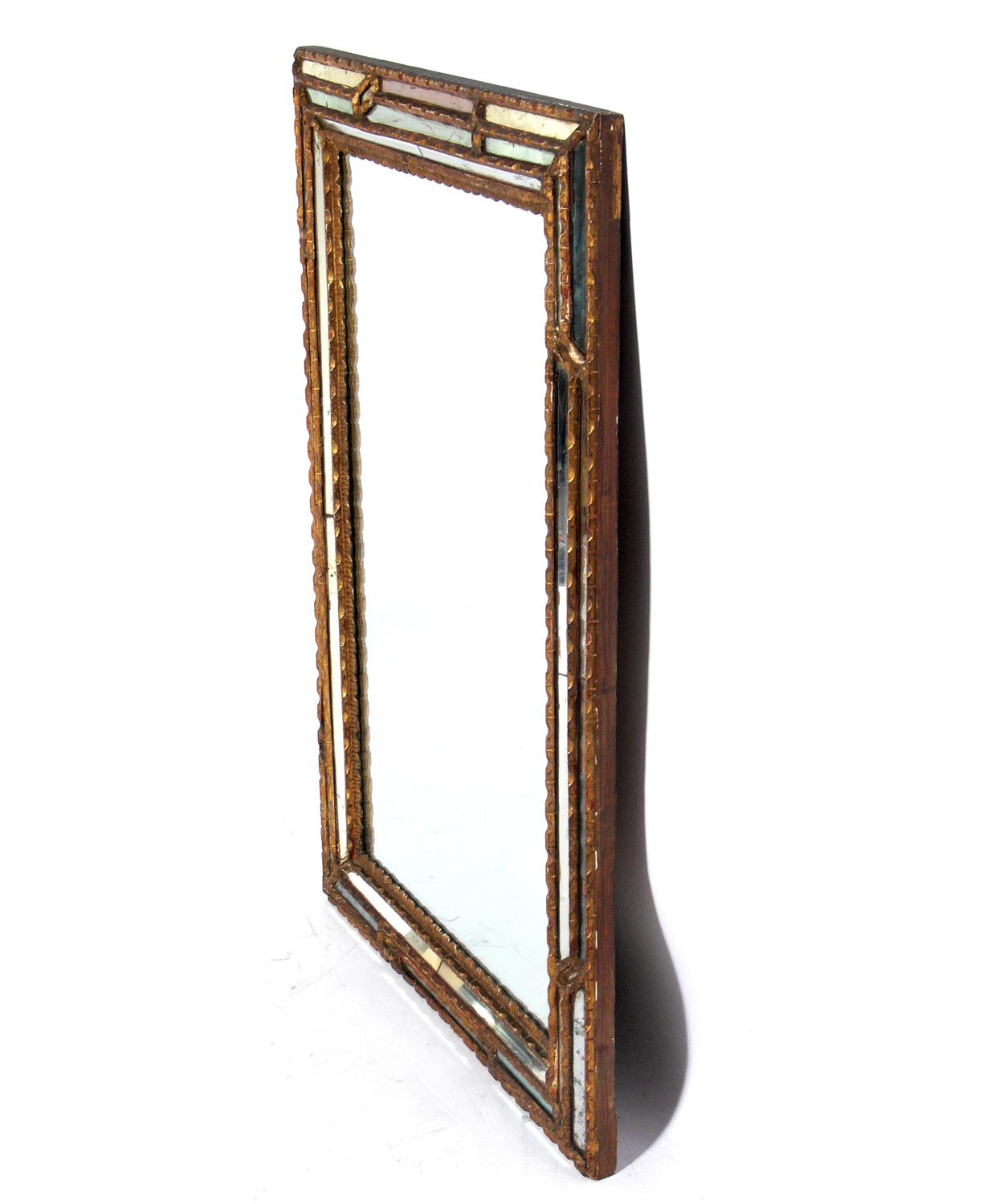 Italian gilt mirror, Italy, circa 1950s. Retains wonderful original patina to both the gilt frame and the mirrored portions.