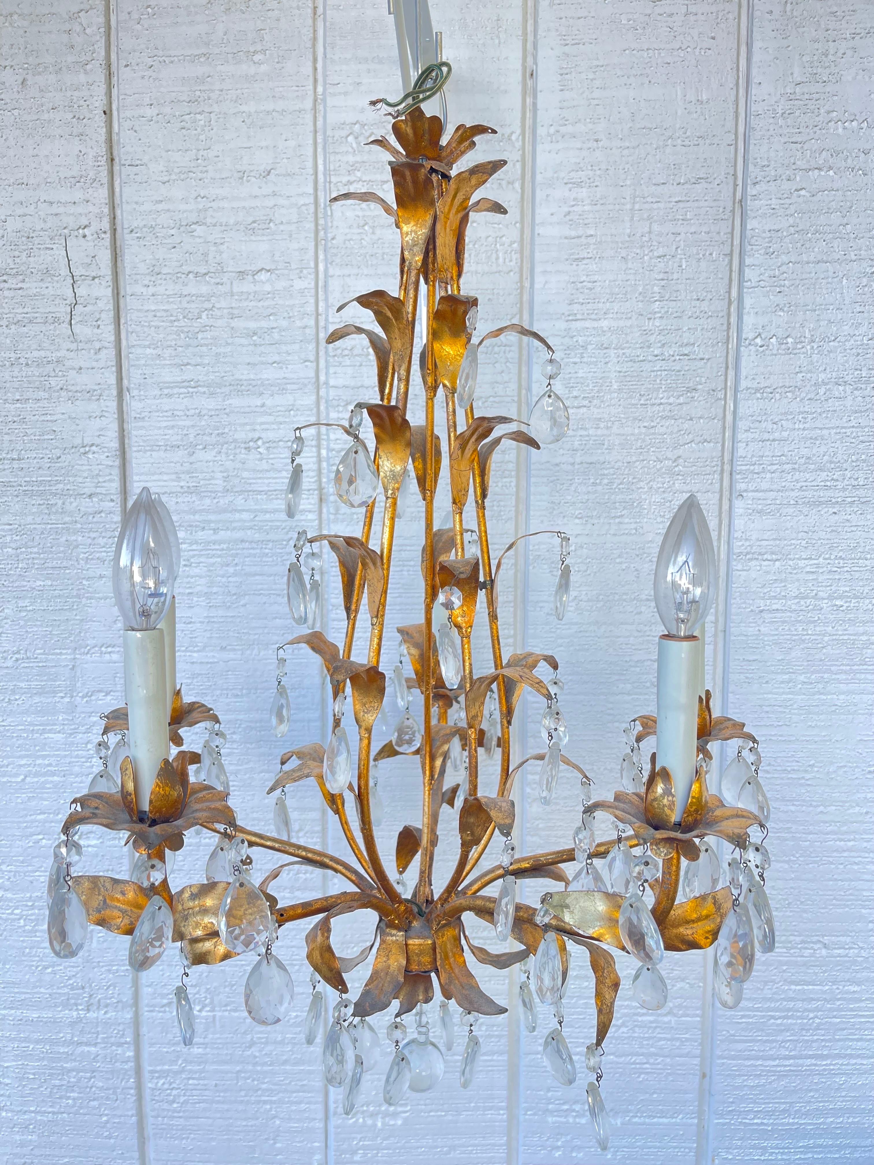 Italian Gilt Tole and Crystal Chandelier. Elegant five arm chandelier. Very high glam. Perfect for a dressing room or powder room.