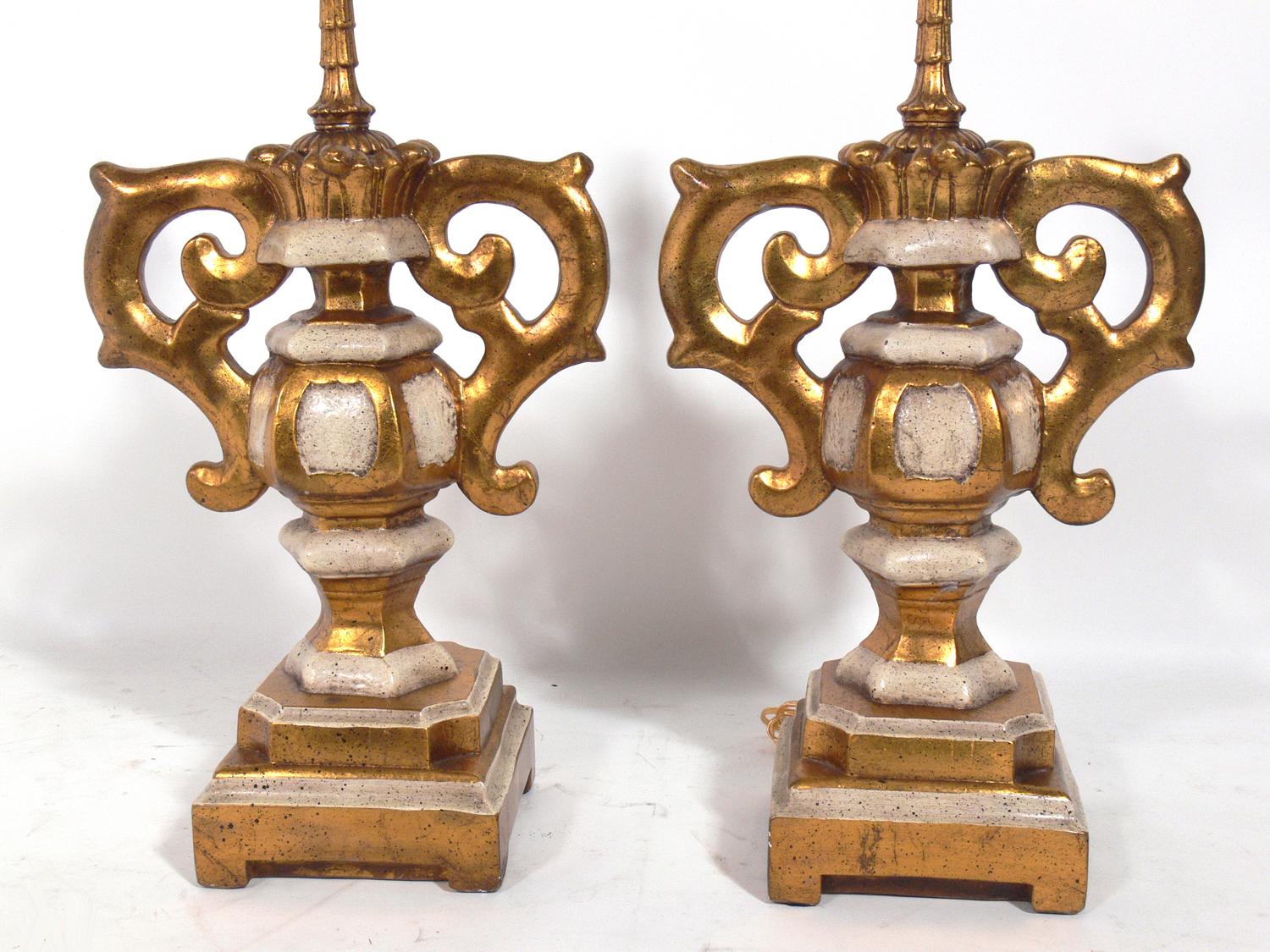 Italian gilt plaster urn lamps, Italy, circa 1950s. They have been rewired and are ready to use. The price and measurements noted includes the shades.