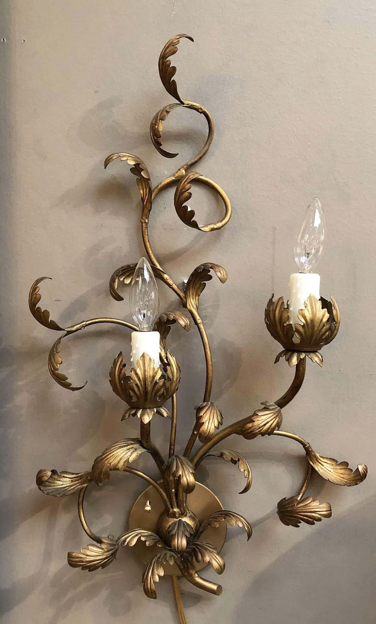A handsome Italian wall light or sconce from the late 19th century. Art Nouveau period, in the form of entwined leaves with two branches to form two lights.

U.S. wired and ready for display.




