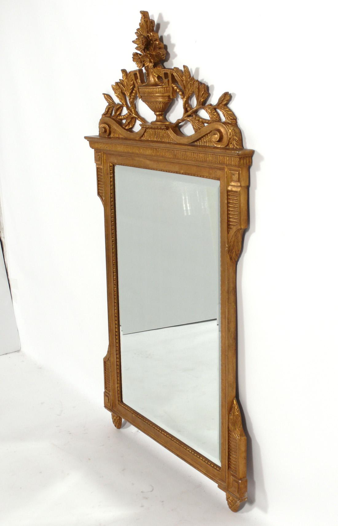 Italian Gilt Wood Beveled Mirror, Italy, circa 1950s. This mirror was recently removed from the legendary Carlyle Hotel in NYC. It measures an impressive 56.5