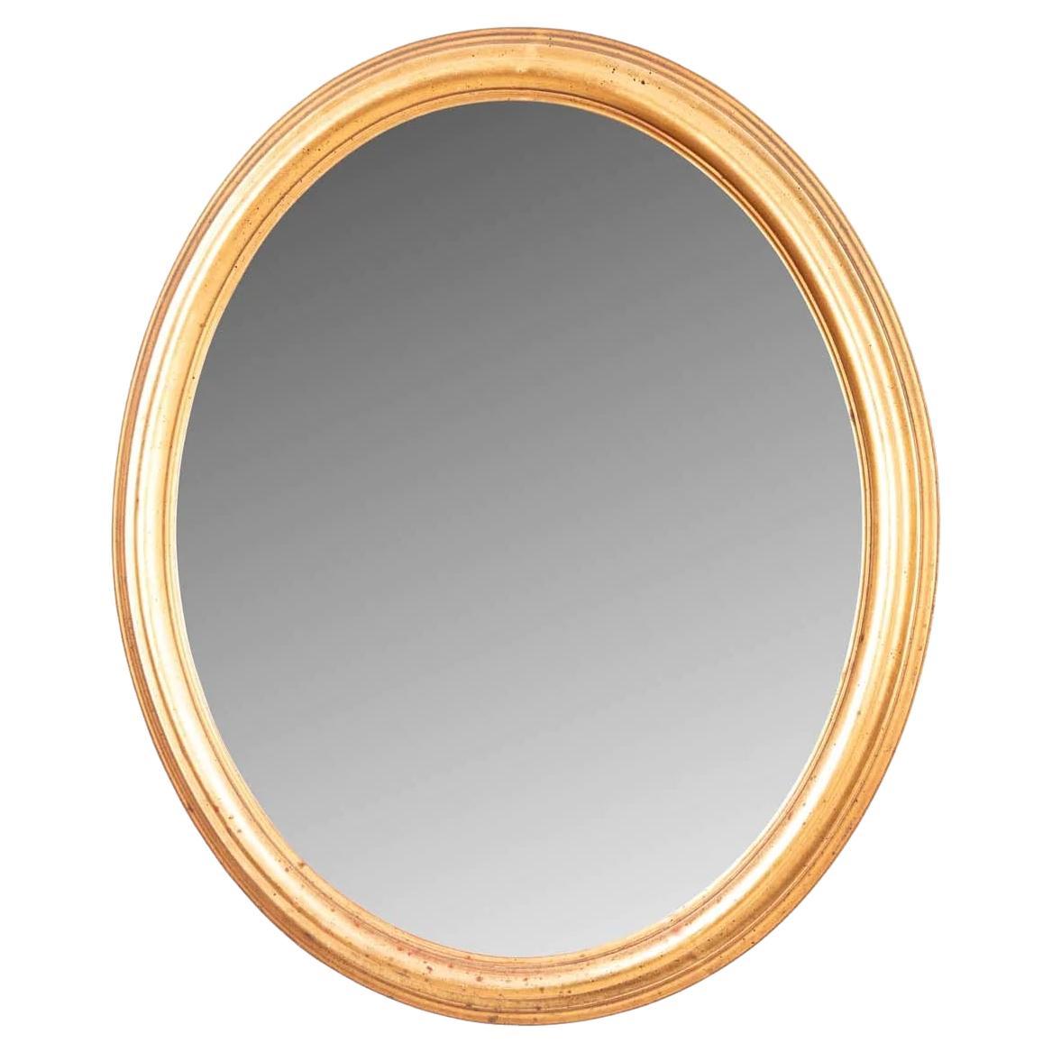 Miroir italien en bois doré