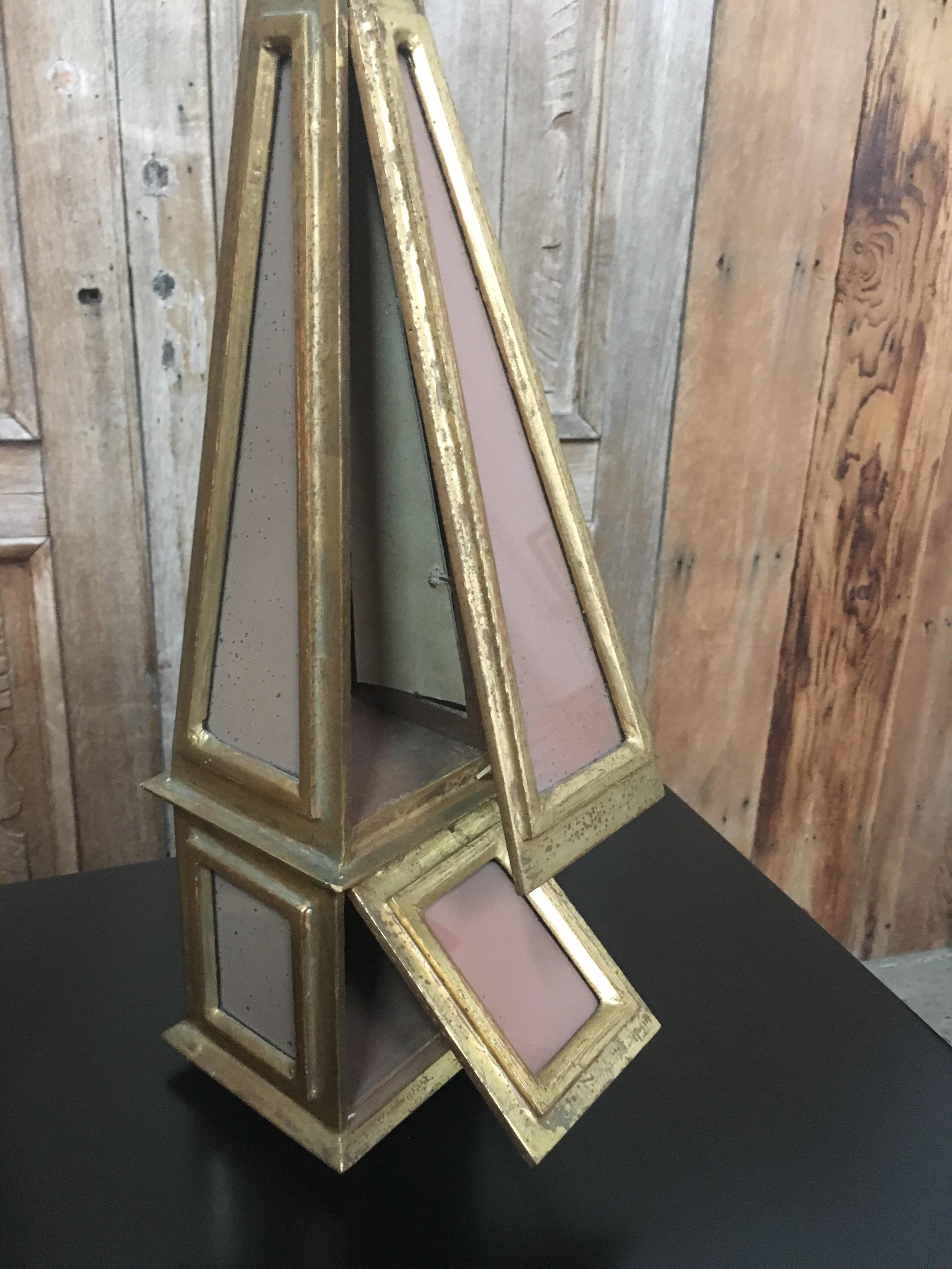 Pair of 1960s Italian obelisk handcrafted in Italy with a combination of giltwood and glass also a hidden compartment on each one made by Florentia.