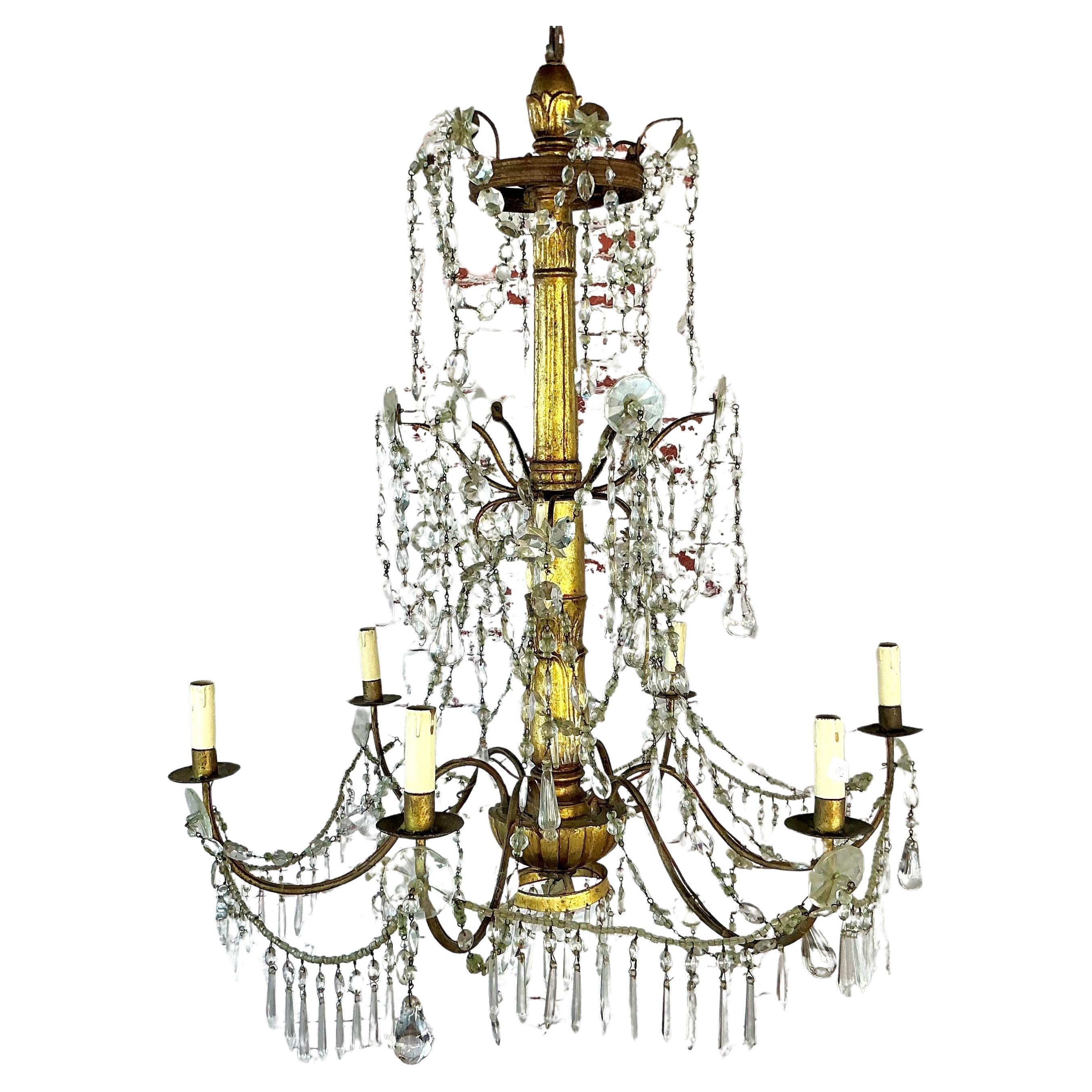 Lampadario italiano a sei luci in legno dorato e cristallo