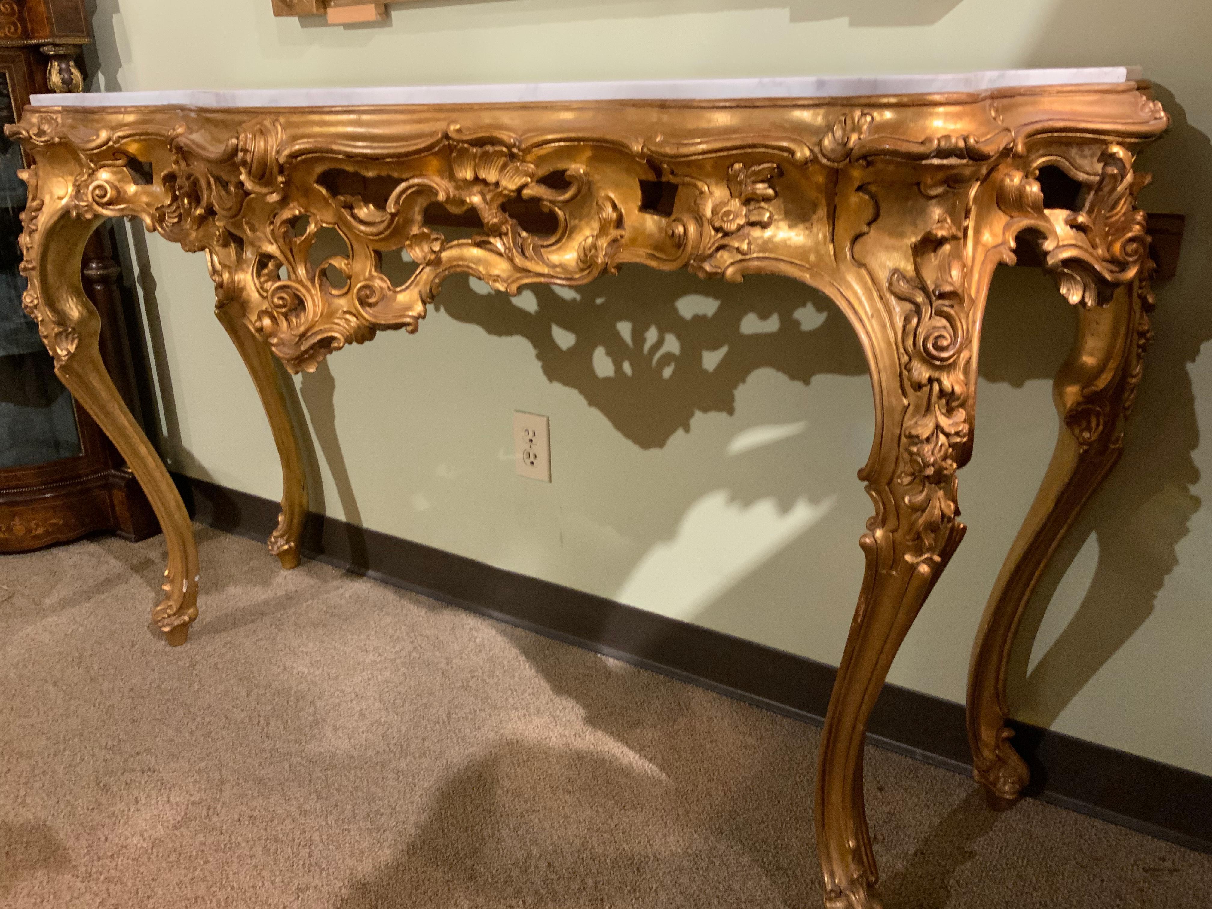 20th Century Italian Giltwood and White Marble-Top Console Table with Scrolls /Floral Motif For Sale