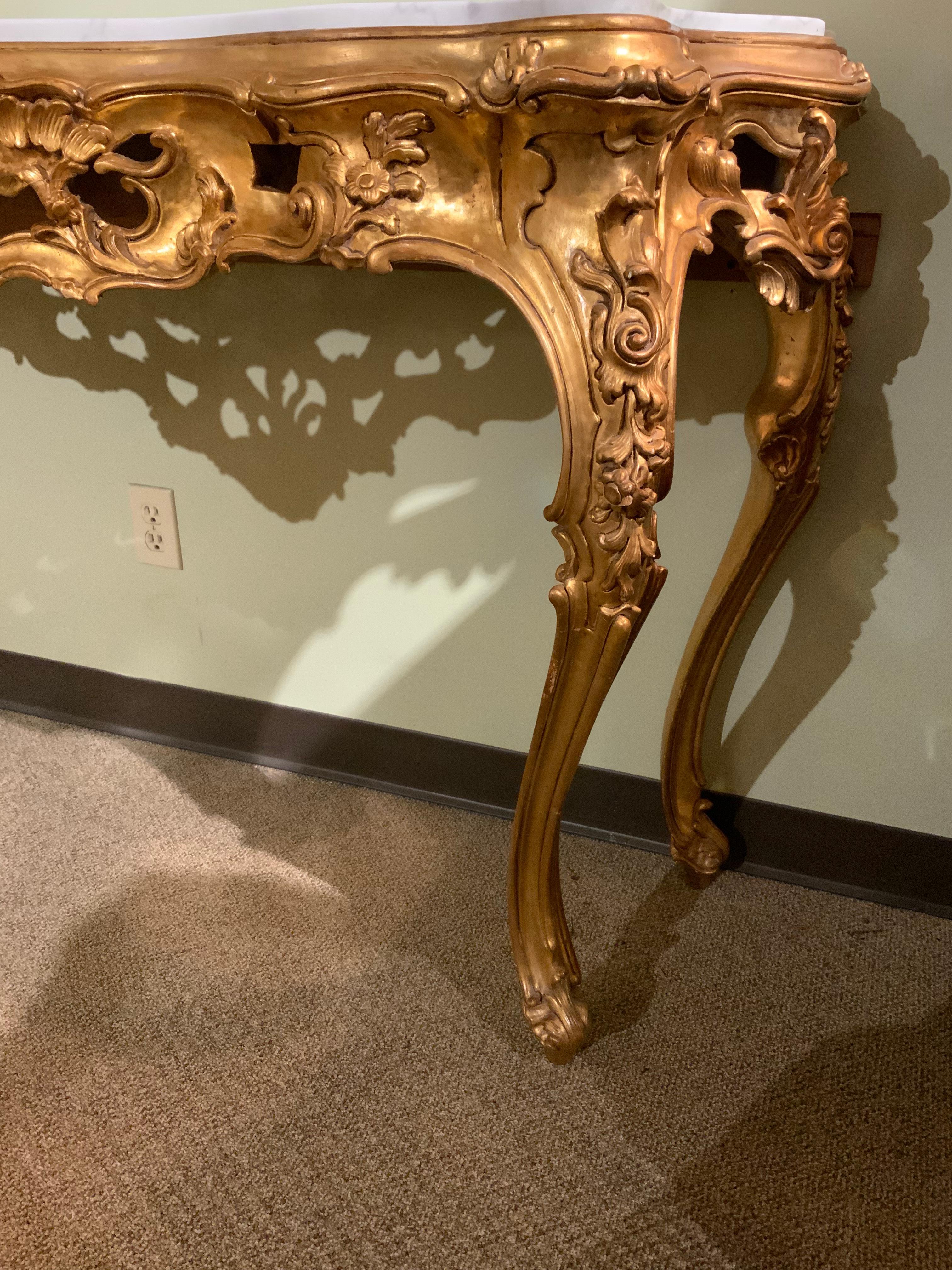 Italian Giltwood and White Marble-Top Console Table with Scrolls /Floral Motif For Sale 1