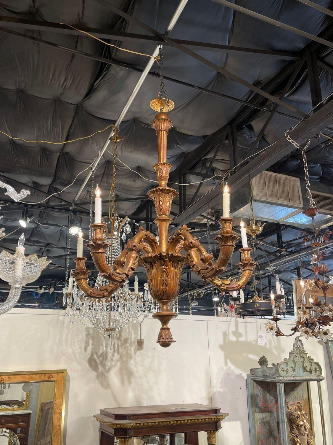 19th century Italian carved and giltwood 5-light chandelier. Circa 1880. The chandelier has been professionally re-wired, cleaned and is ready to hang. Includes matching chain and canopy.