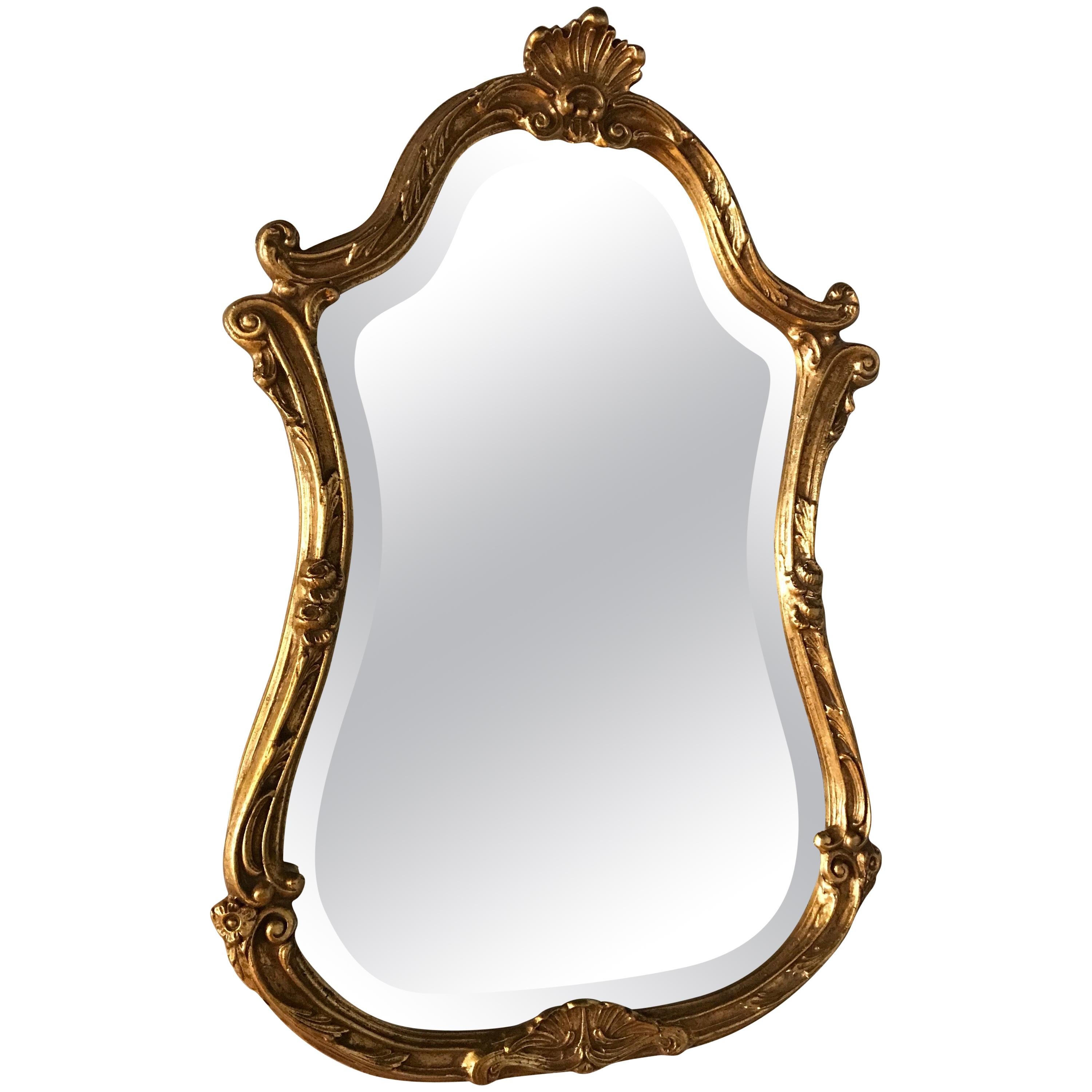 Italian Giltwood Mirror Topped with a Small Shell by Decorative Arts