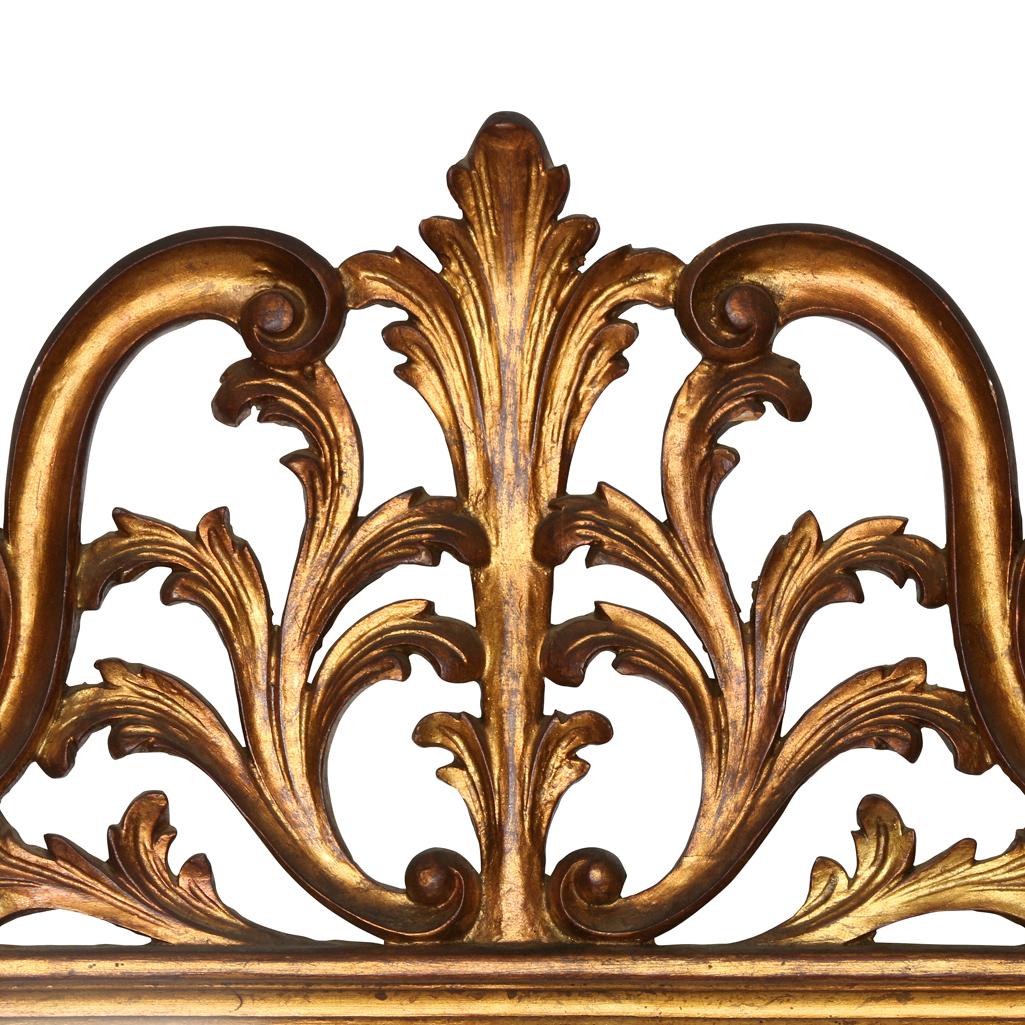 Italian giltwood vintage florentine mirror in rococo style with acanthus leaf details.