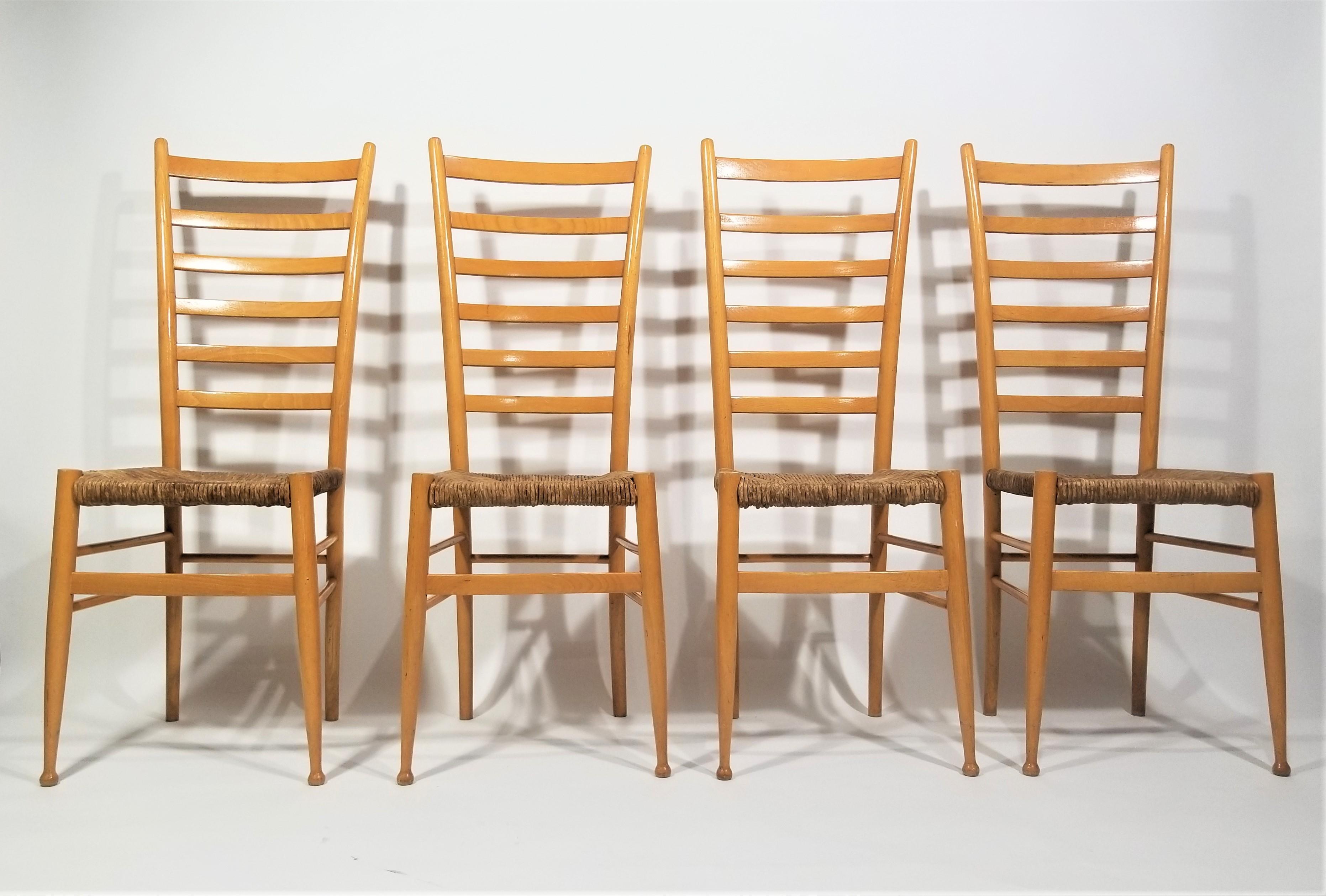 1970s Mid Century Italian Tall Ladder Back Chairs in the style of Gio Ponti. Made in Italy. Set of 4. 

Lightweight and easy to move. Wear consistent with age and use. 
