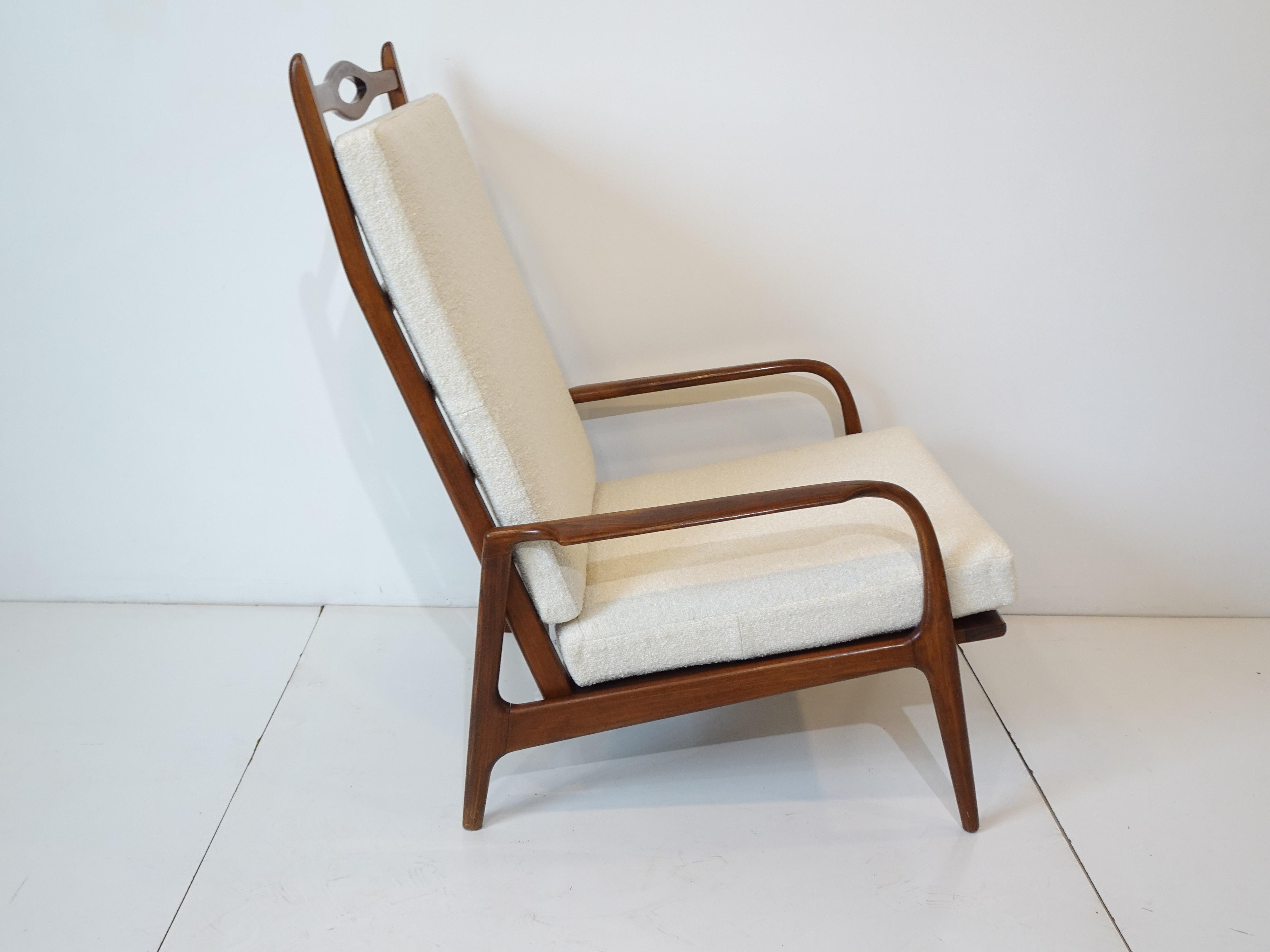 Mid-Century Modern Johannes Anderesn styled Walnut Framed Lounge Chair with Boucle Fabric For Sale
